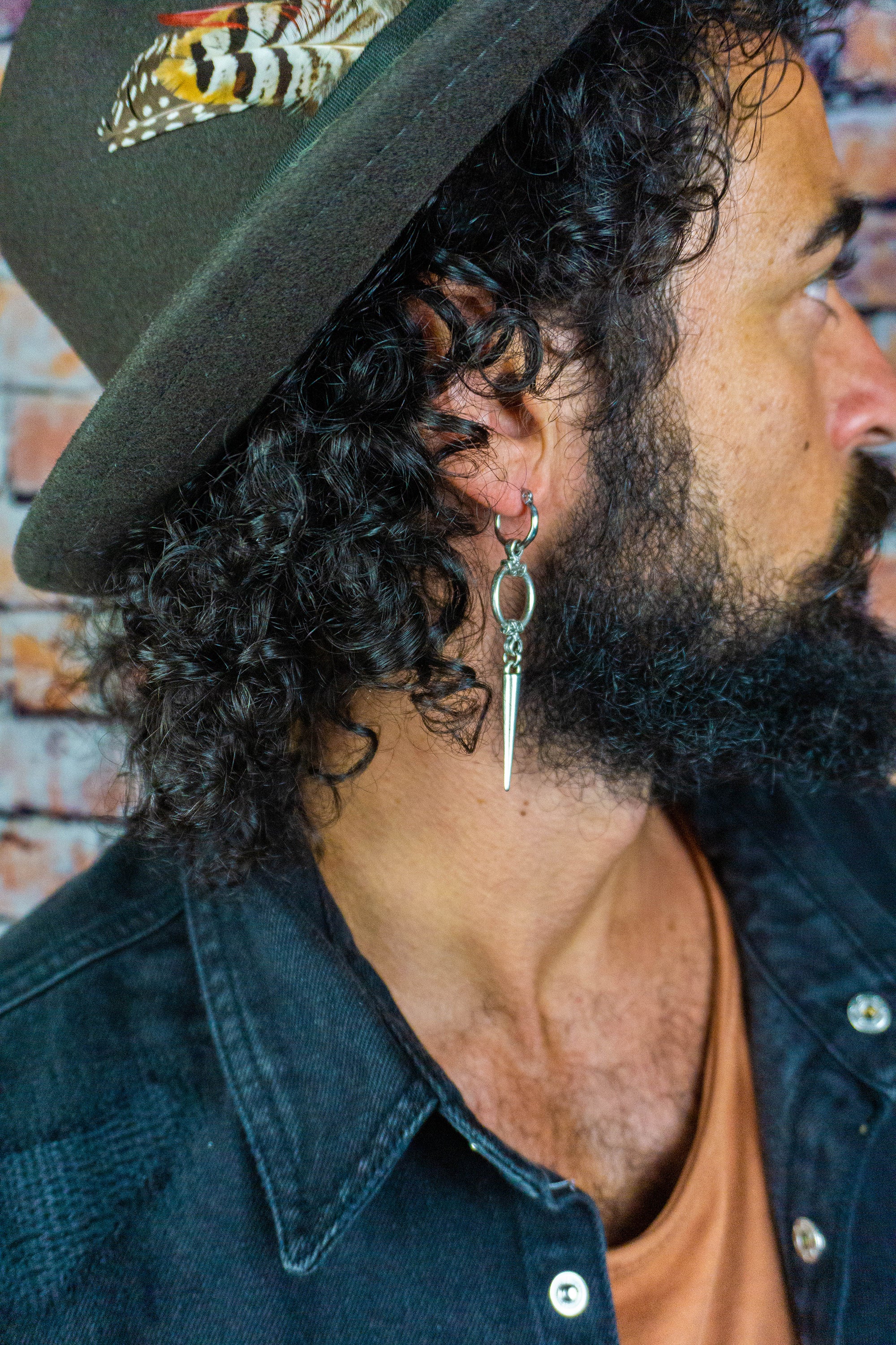 mens long silver spike dangle earring with a circle ring in the middle-wander jewellery
