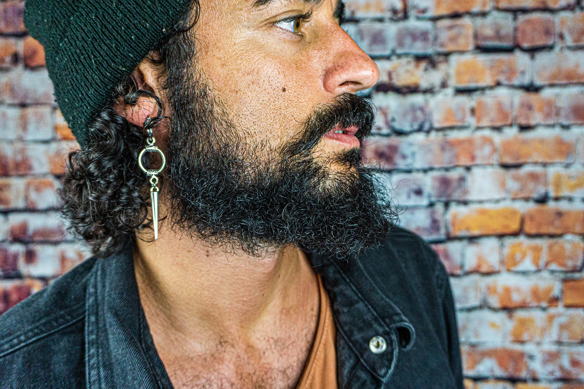 mens long silver spike earring with a circle in the middle-wander jewellery