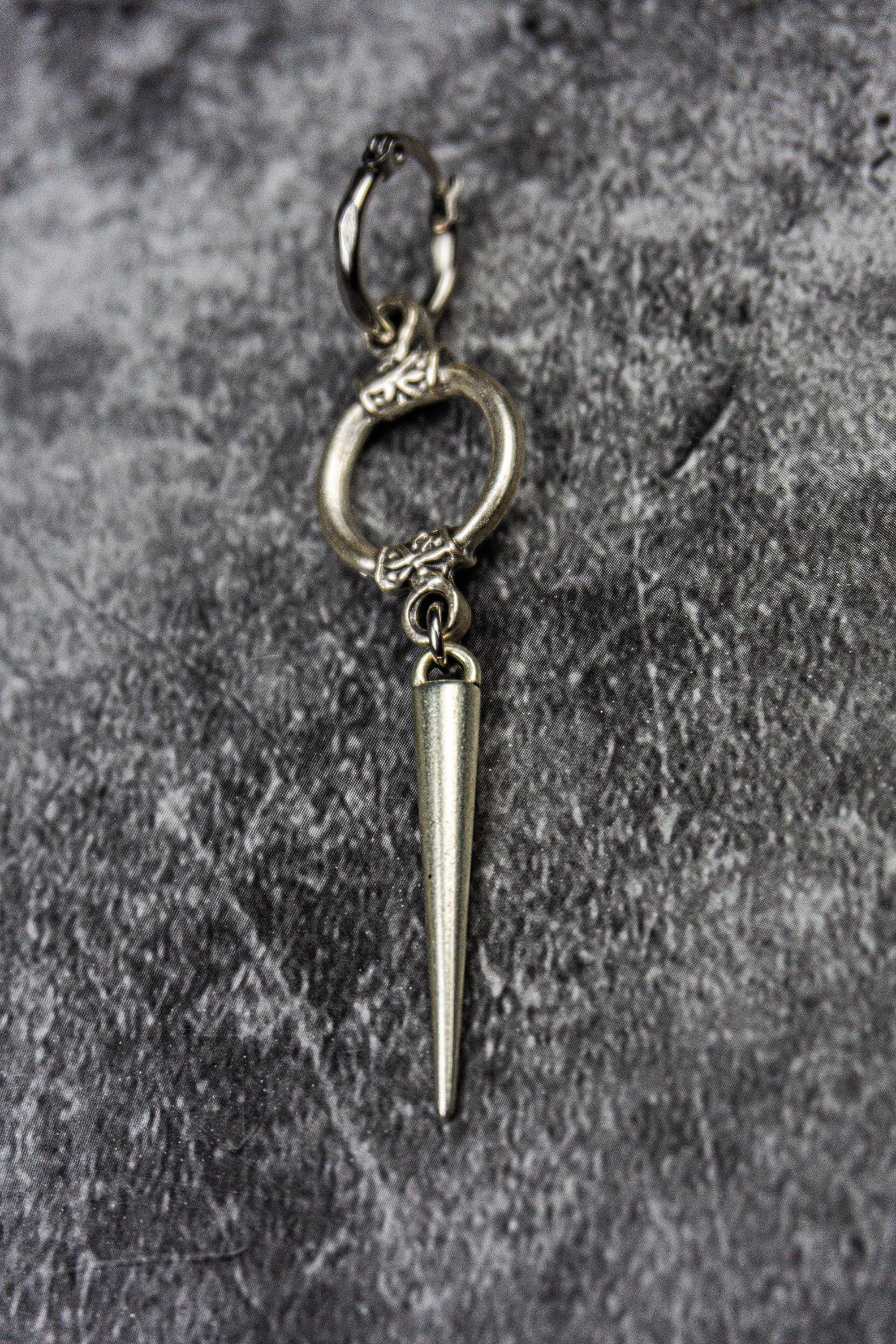 hoop earring with a circle ring and a long dangle silver spike-wander jewellery