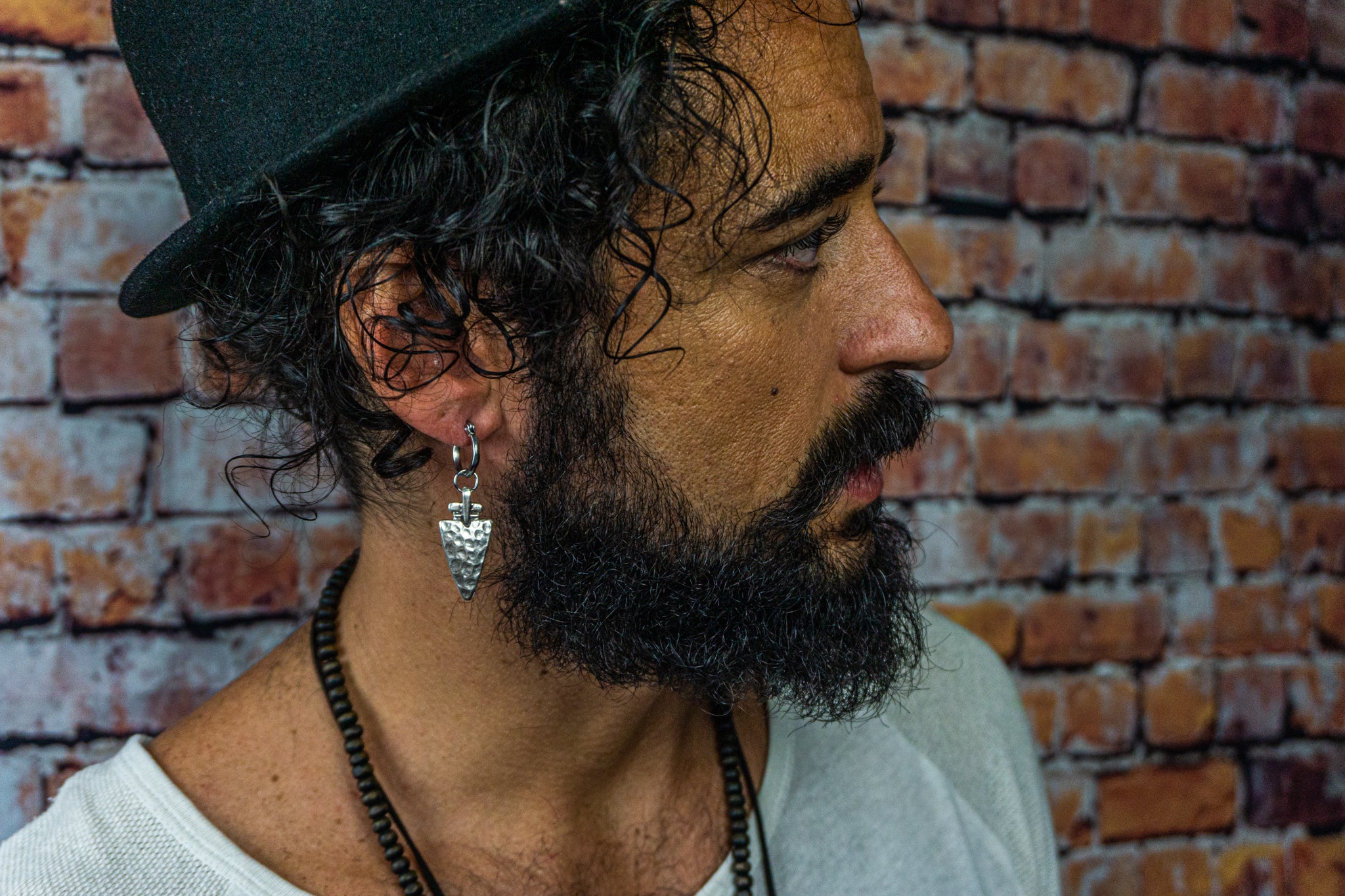 mens hoop earring with a arrowhead charm-wander jewellery