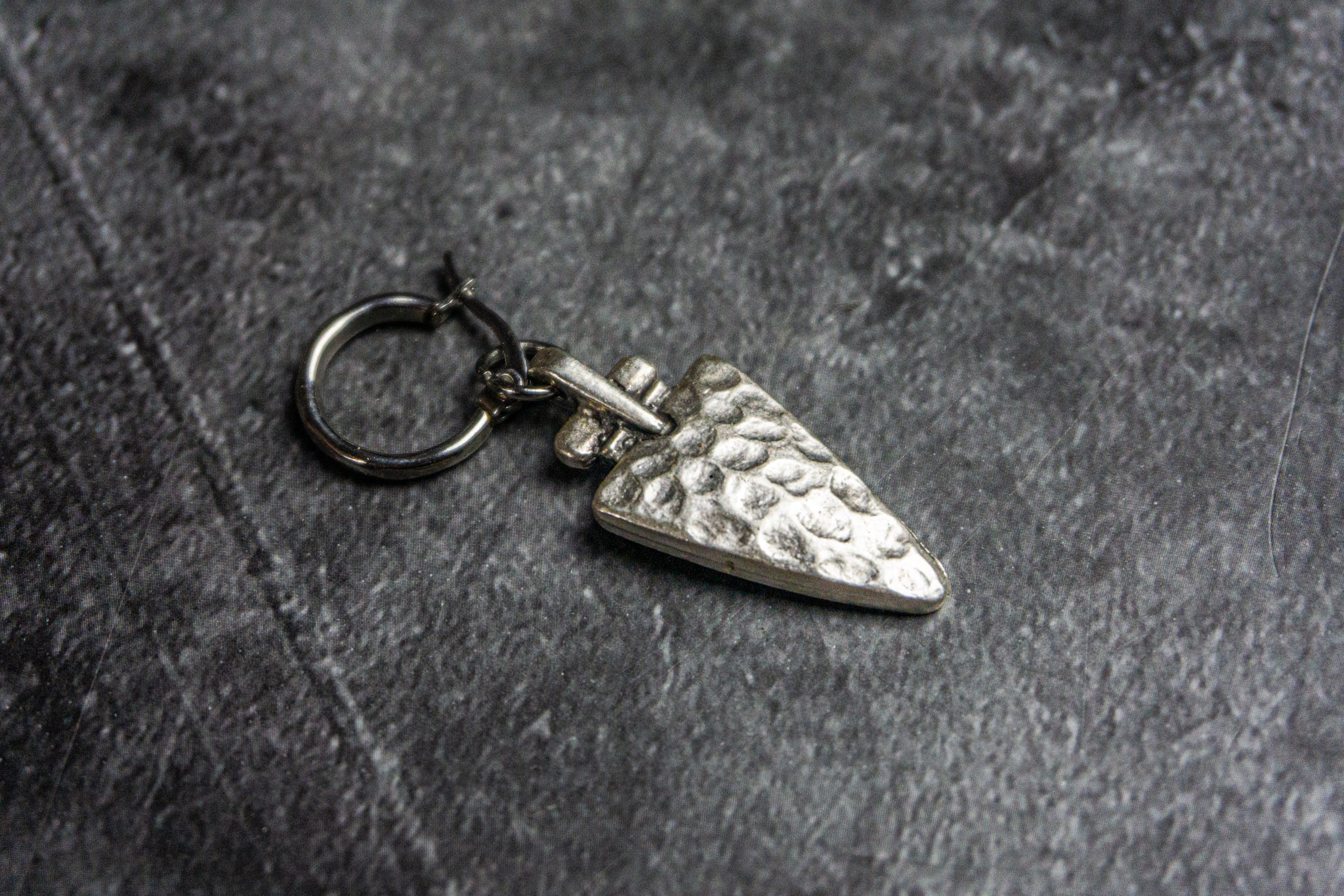 hoop earring with a silver hammered triangle charm-wander jewellery