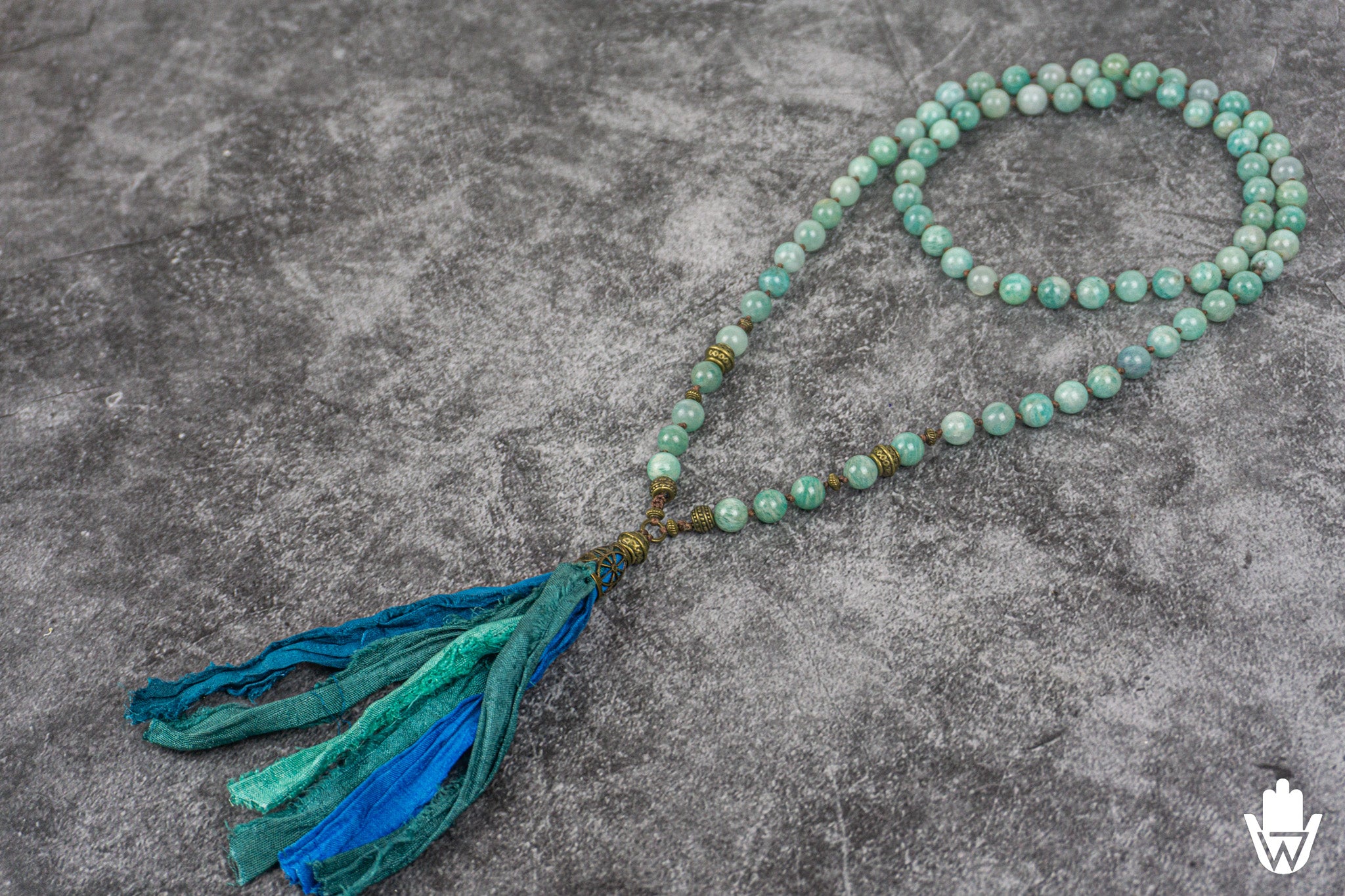 amazonie necklace with a tassel made of turquoise and blue silk