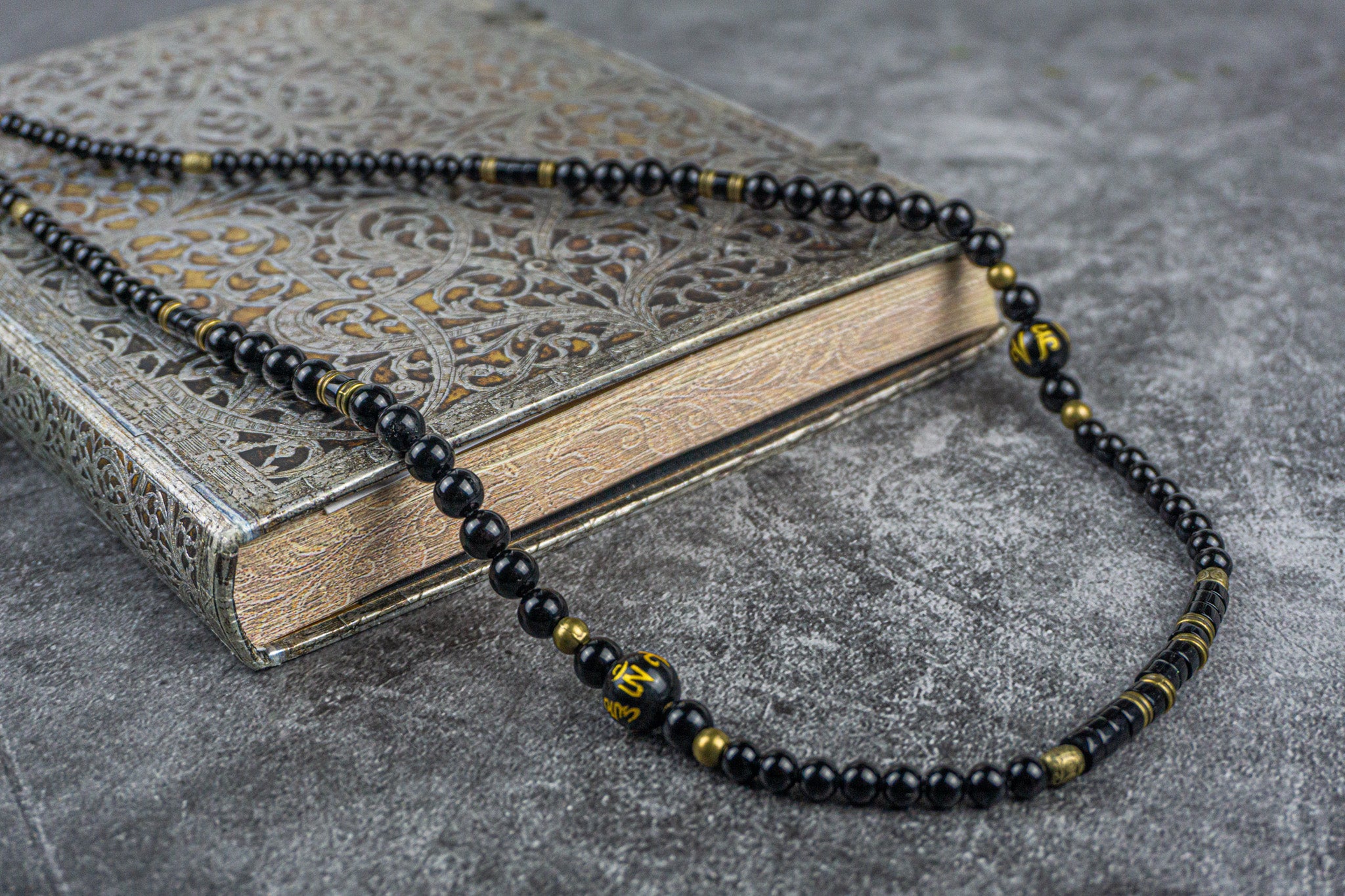 black onyx and antique gold long elegant tibetan ideogram necklace- wander jewellery