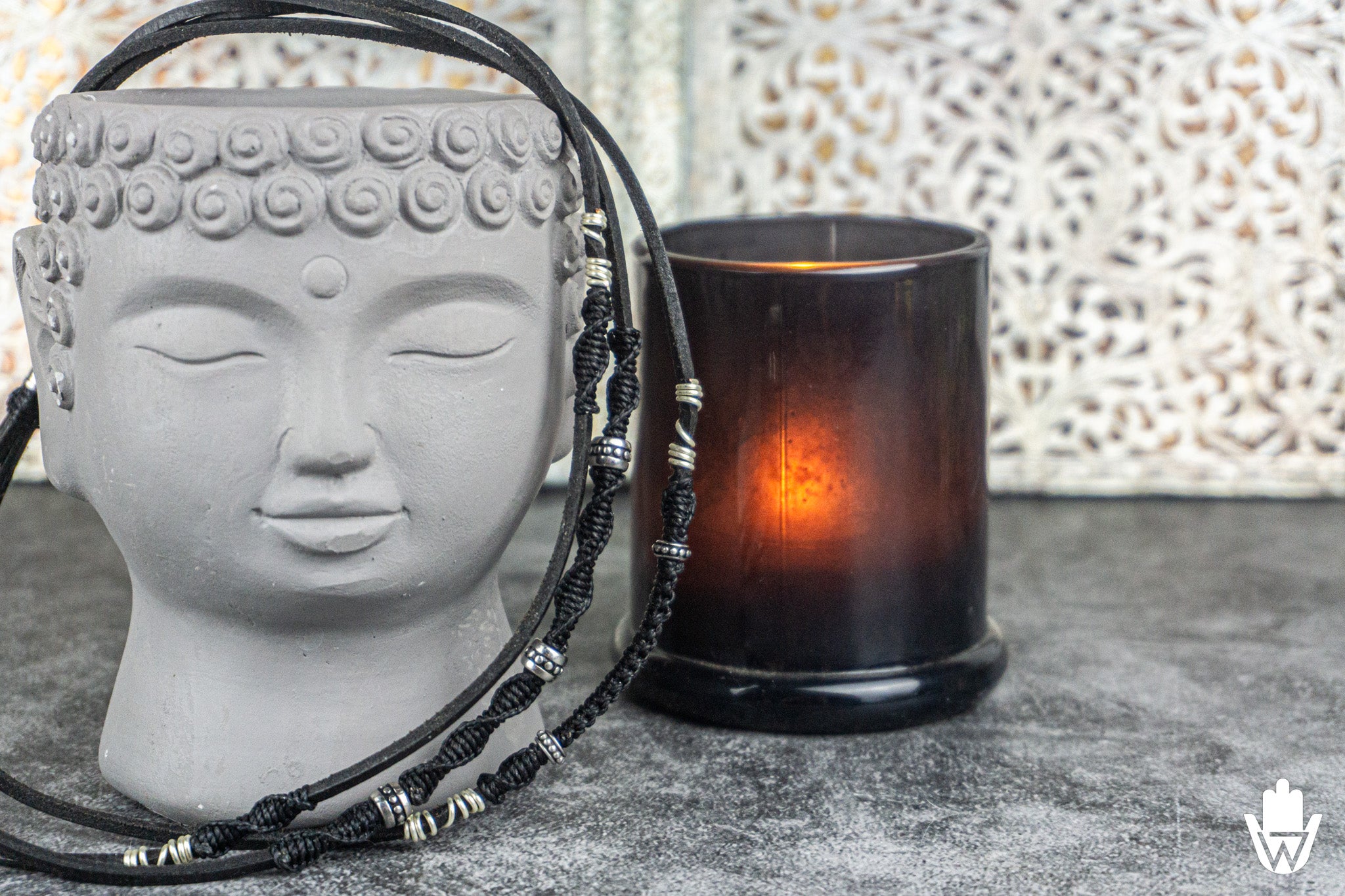 black necklace set in in an artistic backstage