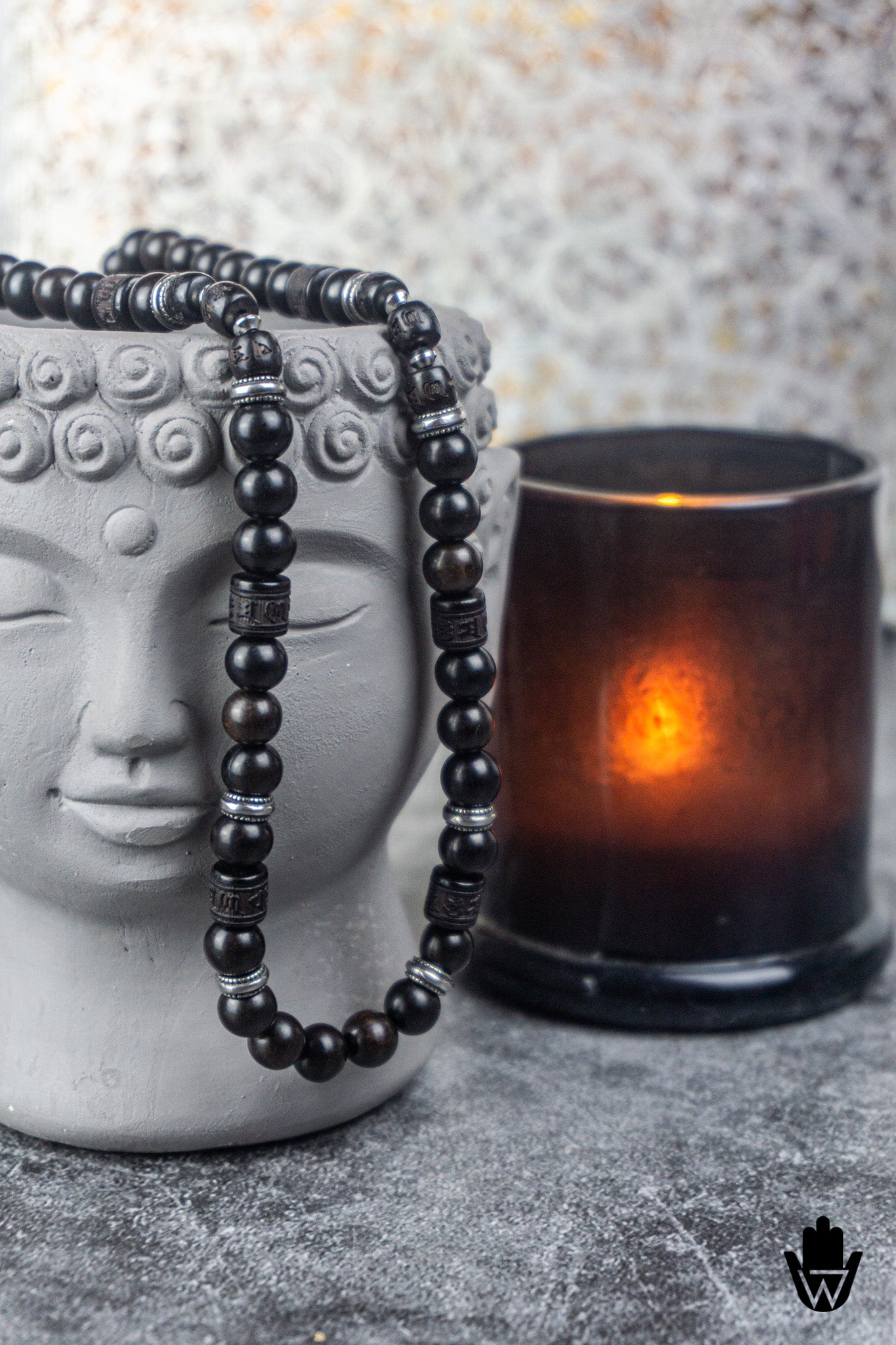 black wooden beaded necklace on a spiritual set