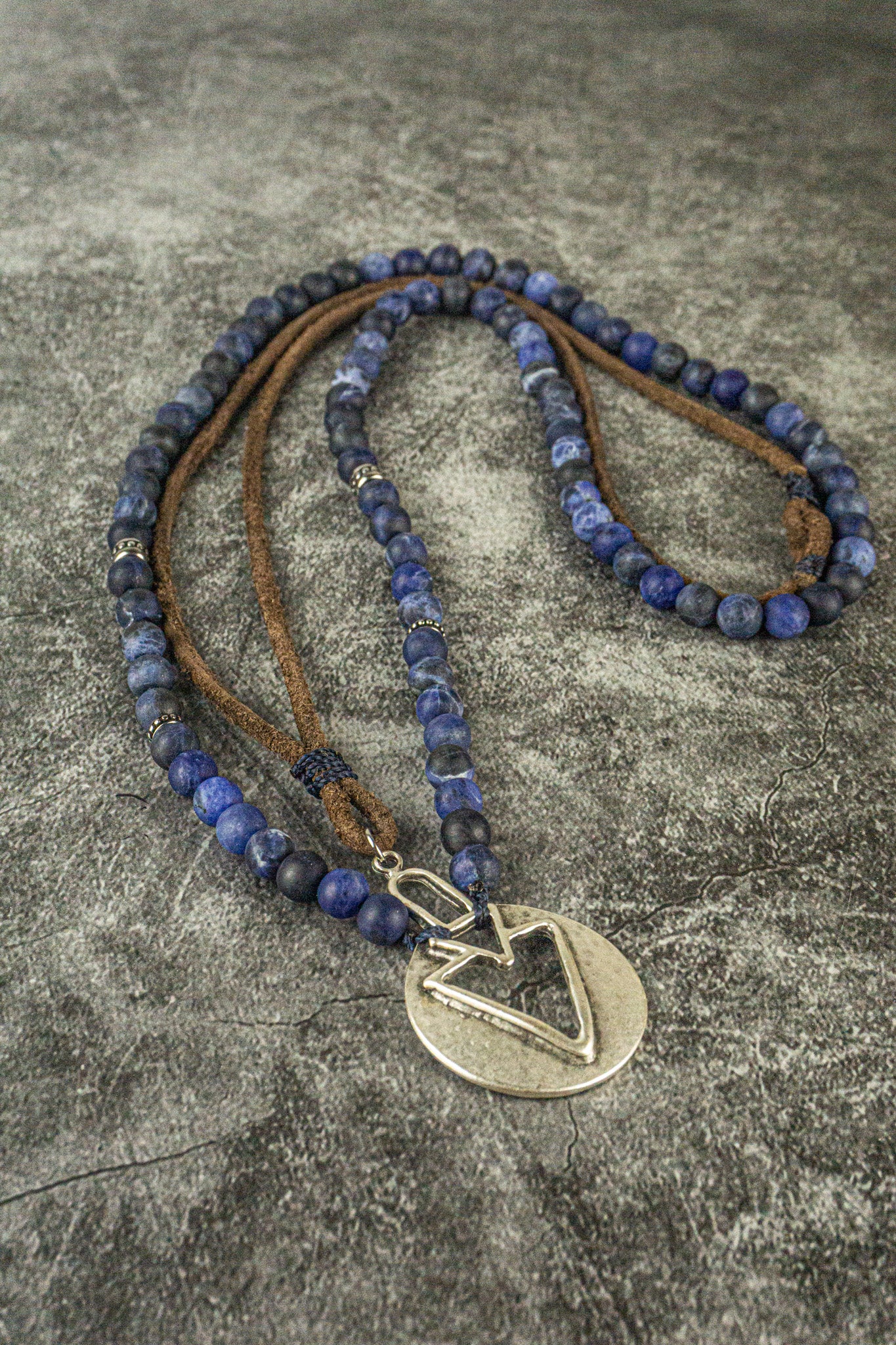 blue sodalite gemstone and leather necklace set with silver arrow pendant- wander jewellery