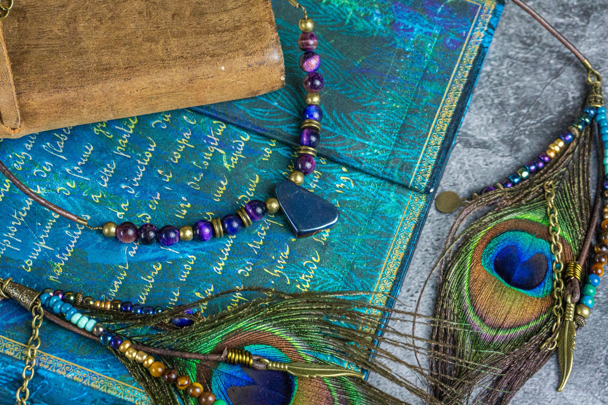bohemian wrap choker made of galaxy tiger eye gemstone and two dangle charm peacock feathers- wander jewellery