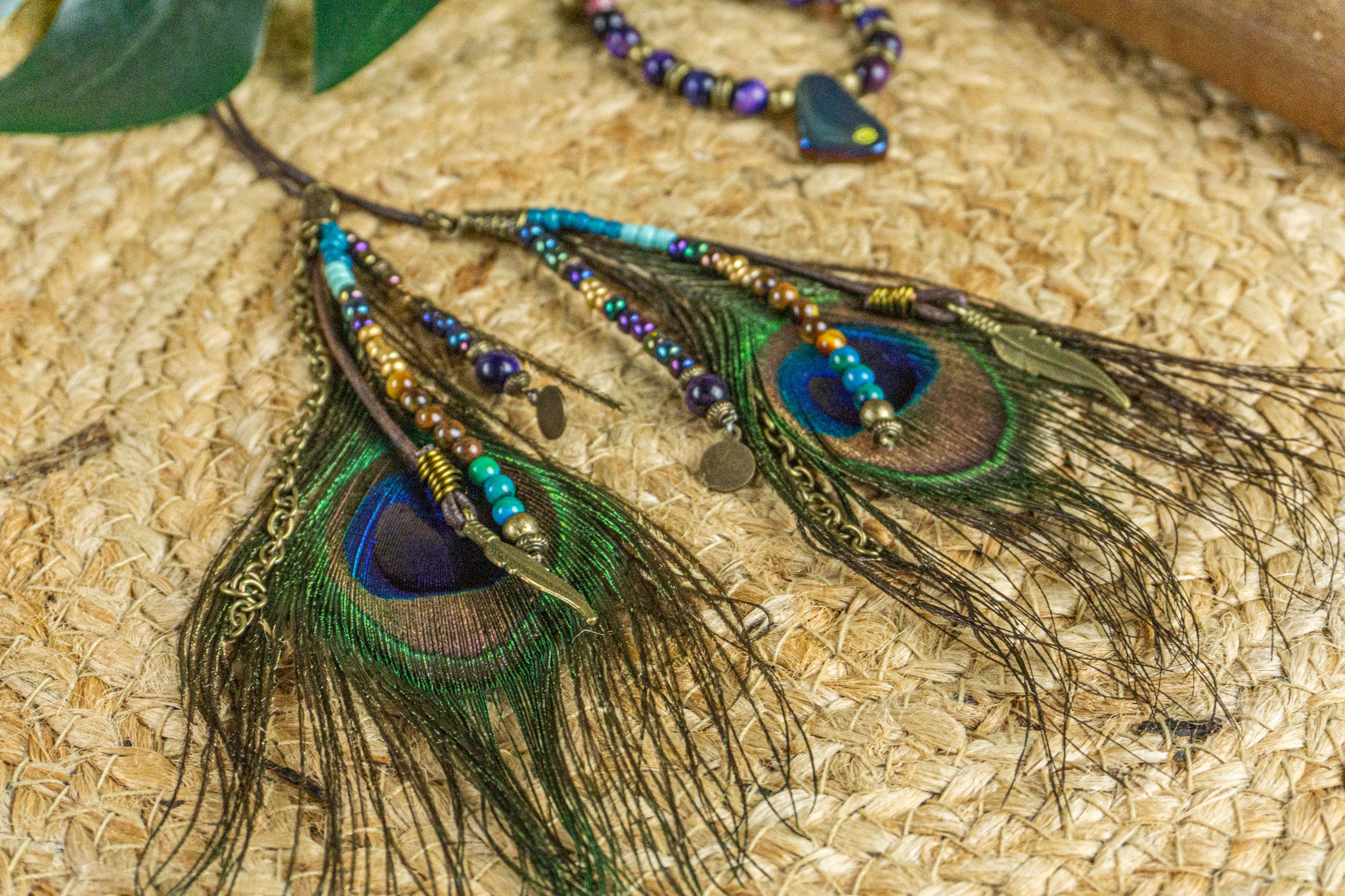 bohemian wrap choker made of tiger eye gemstone and two dangle charm peacock feathers- wander jewellery