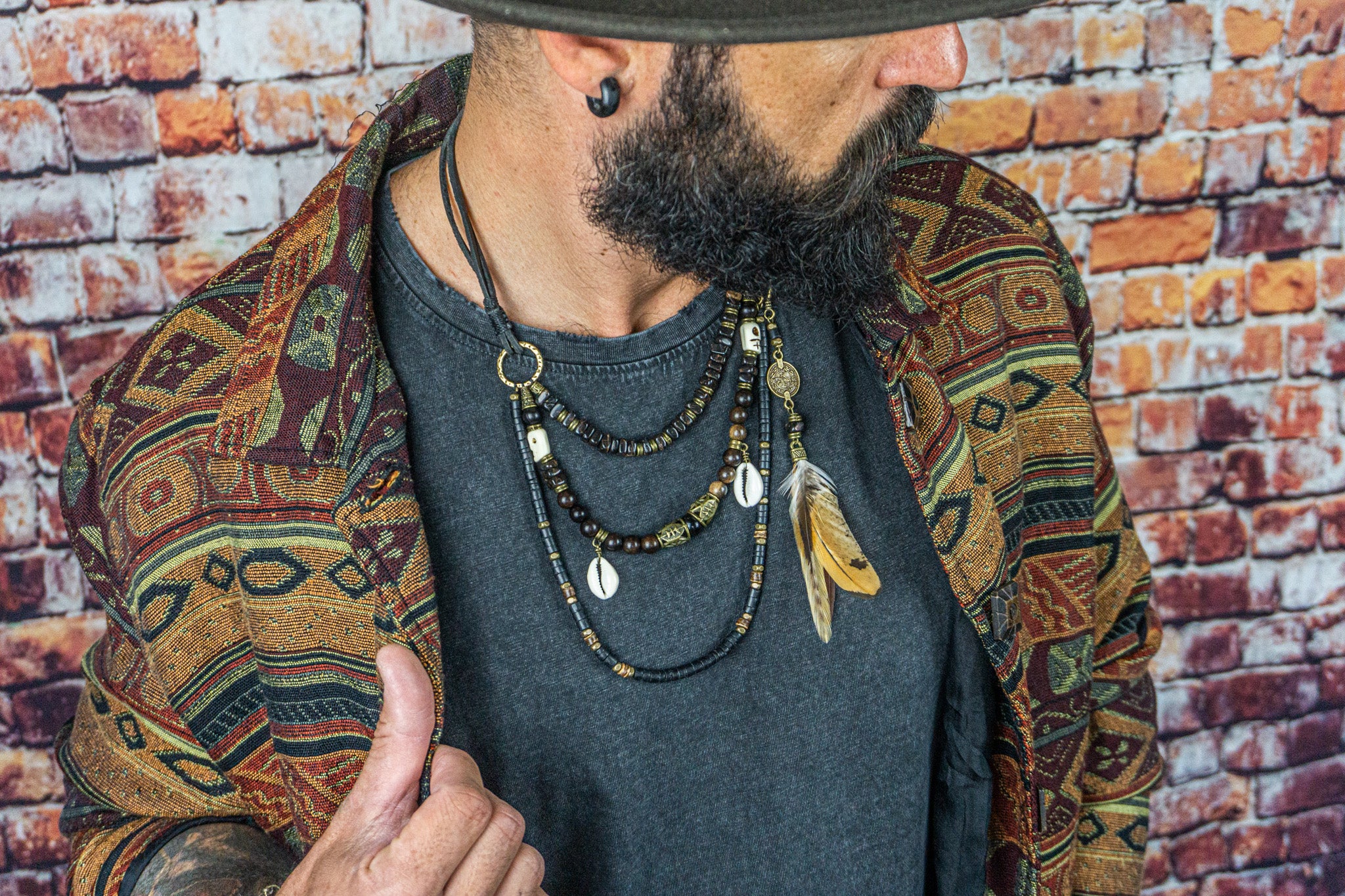 mens black layering necklace set with skull shell and feathers- wander jewellery