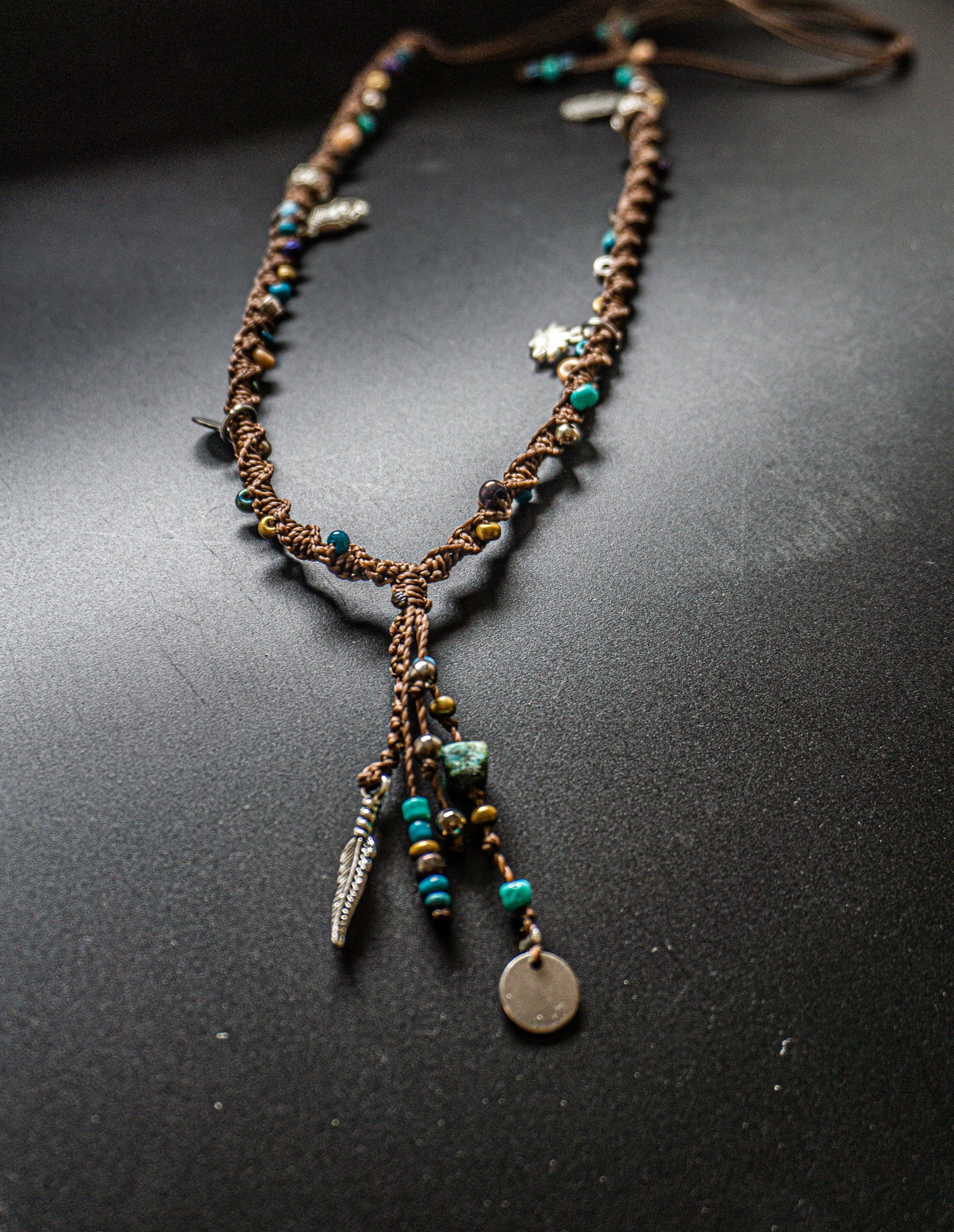 brown macrame necklace with turquoise and silver charms- wander jewellery