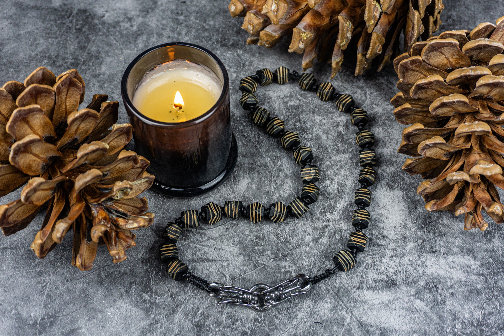 black  beaded necklace with stainless steel dragon closure- wander jewellery