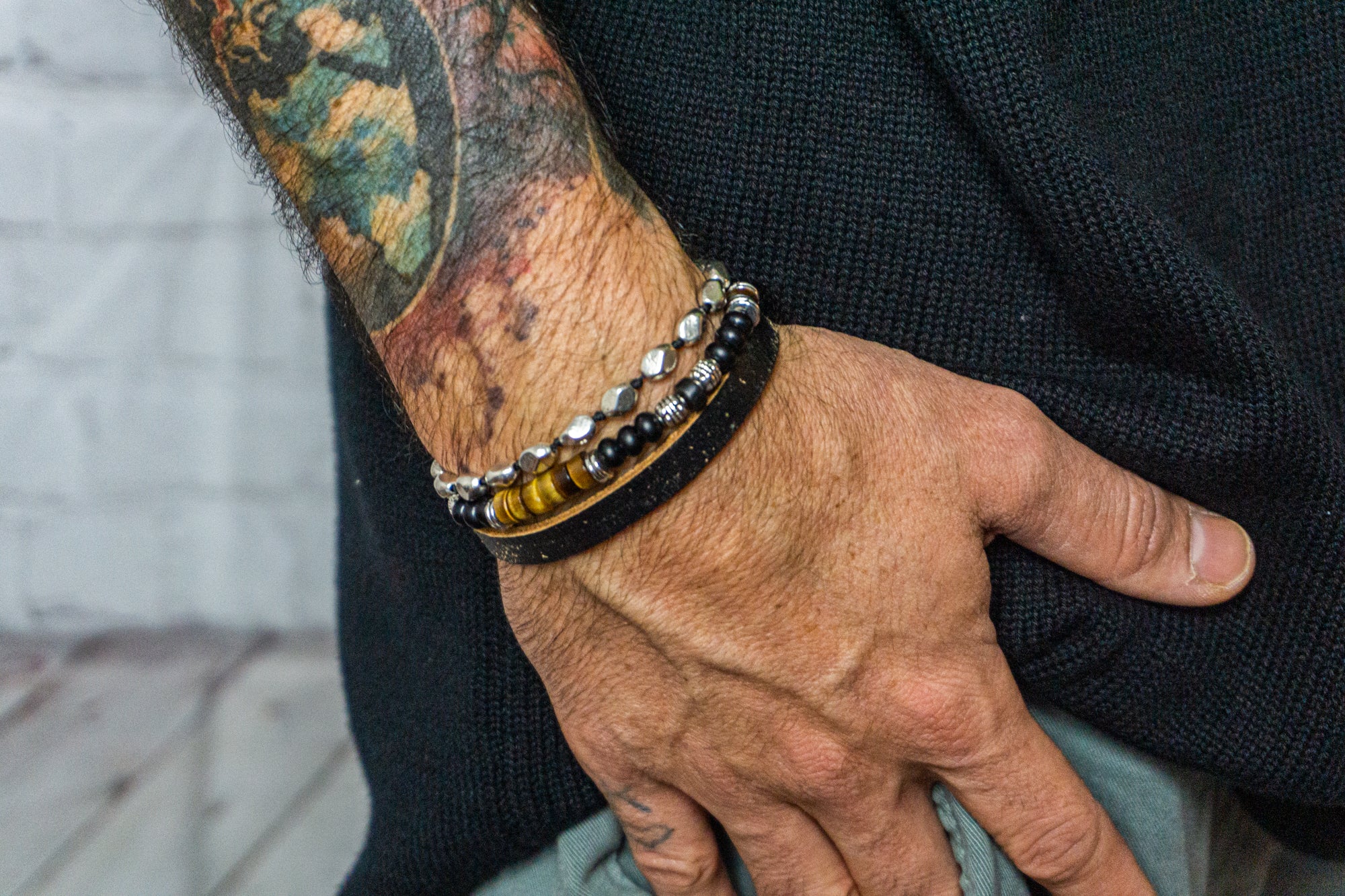 mens bracelet set made of one onyx and tiger eye bracelet, one black leather vintage bracelet and one silver colored adjustable bracelet- wander jewellery
