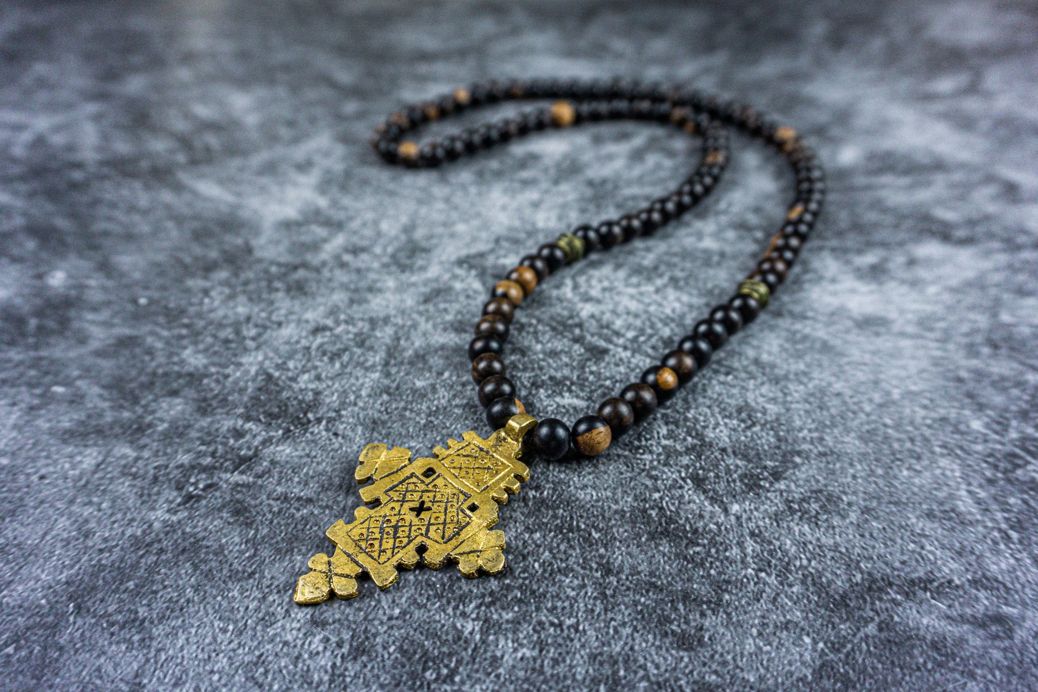 dark brown ebony wood beaded necklace with a bronze ethipoian cross as pendant- wander jewellery