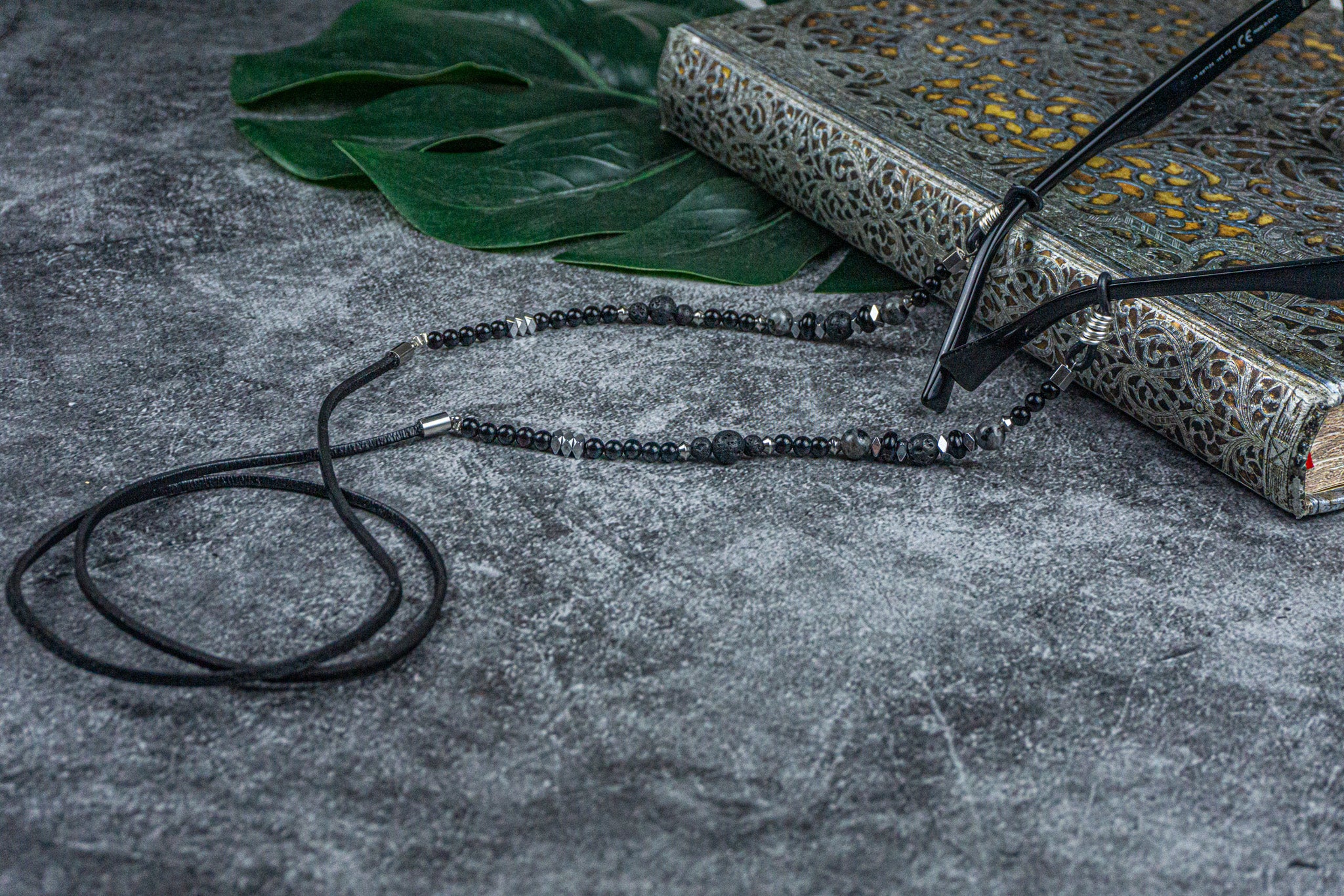 black leather and onyx labradorite and lava stone gemstone beaded glasses chain- wander jewellery