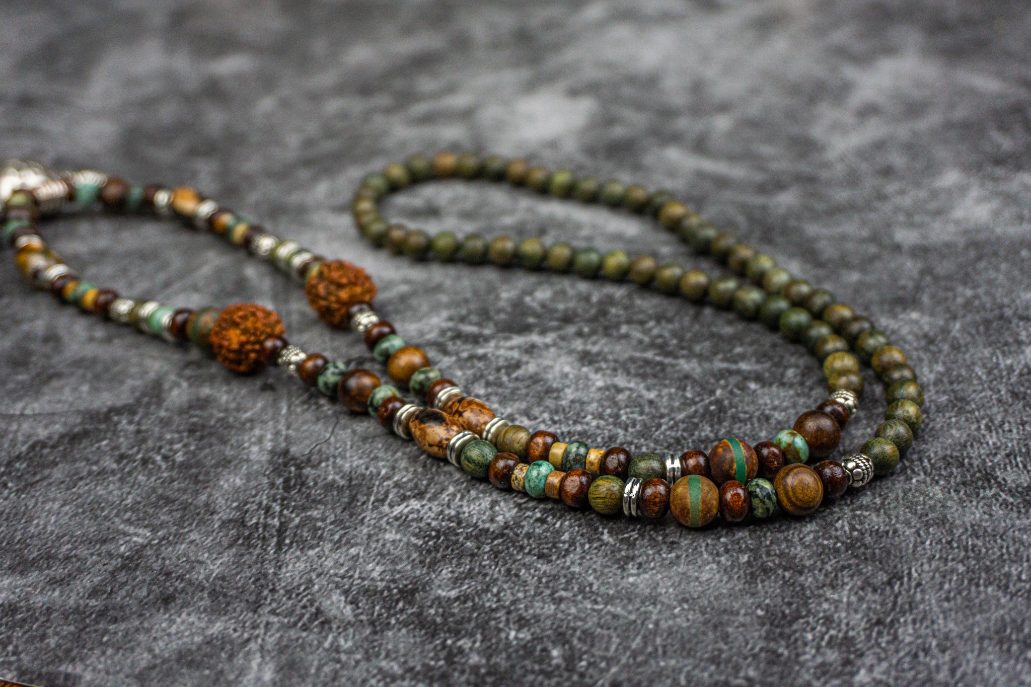 green wood and gemstone beads necklace with a silver colored bull skull pendant- wander jewellery