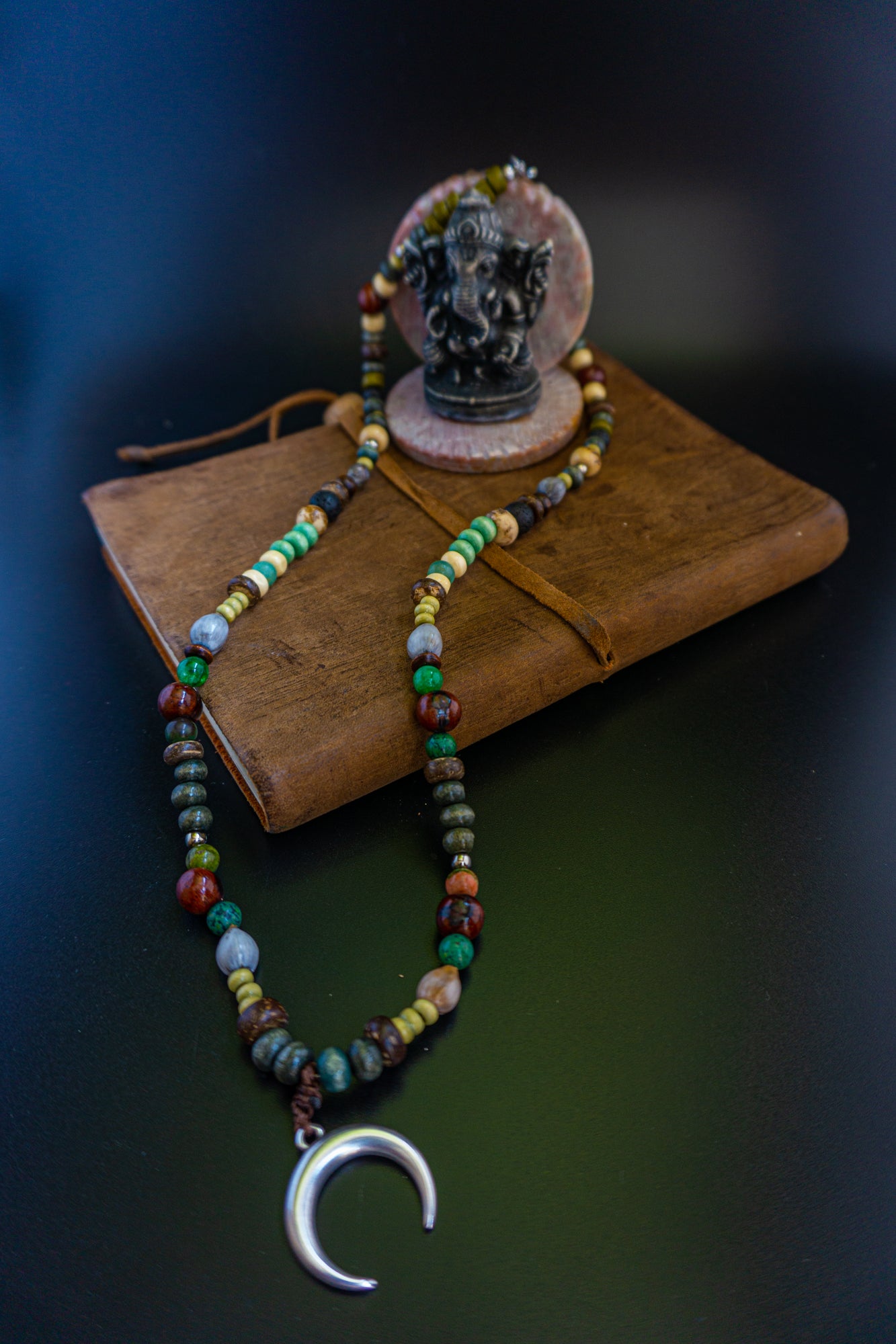 wood and gemstone bead necklace with a silver moon pendant- wander jewellery