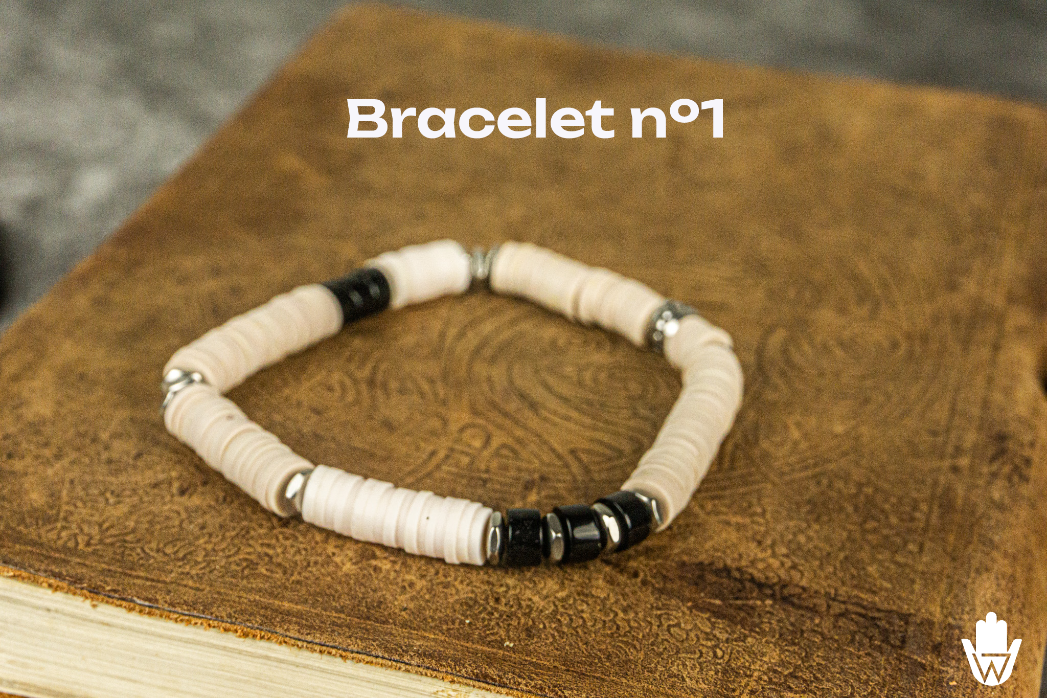 white vinyl heishi bead bracelet with black onyx- wander jewellery