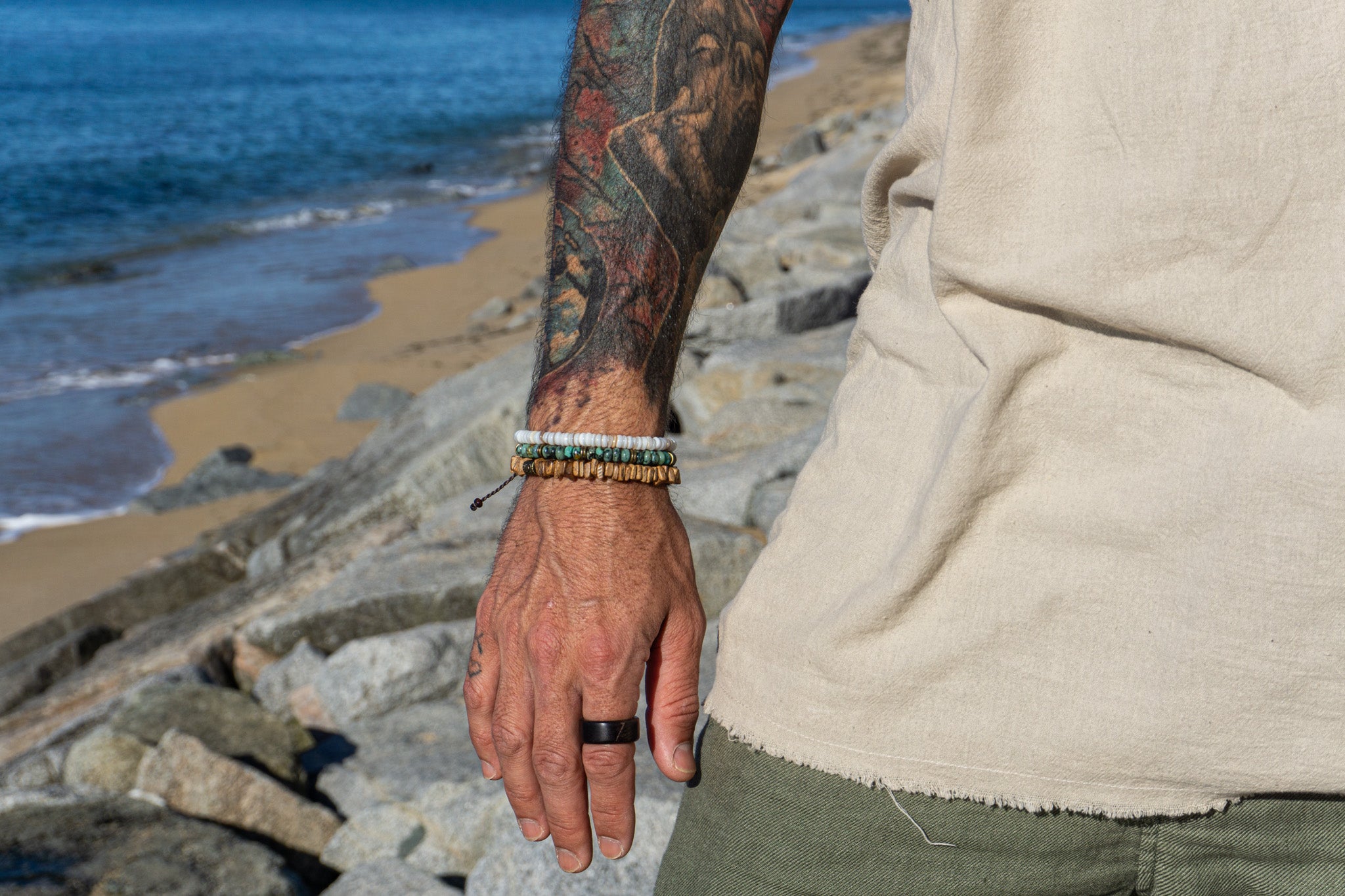 mens matching bracelet set composed by one green gemstone bracelet, one coconut shell bracelet and one white seashell bracelet- wander jewellery