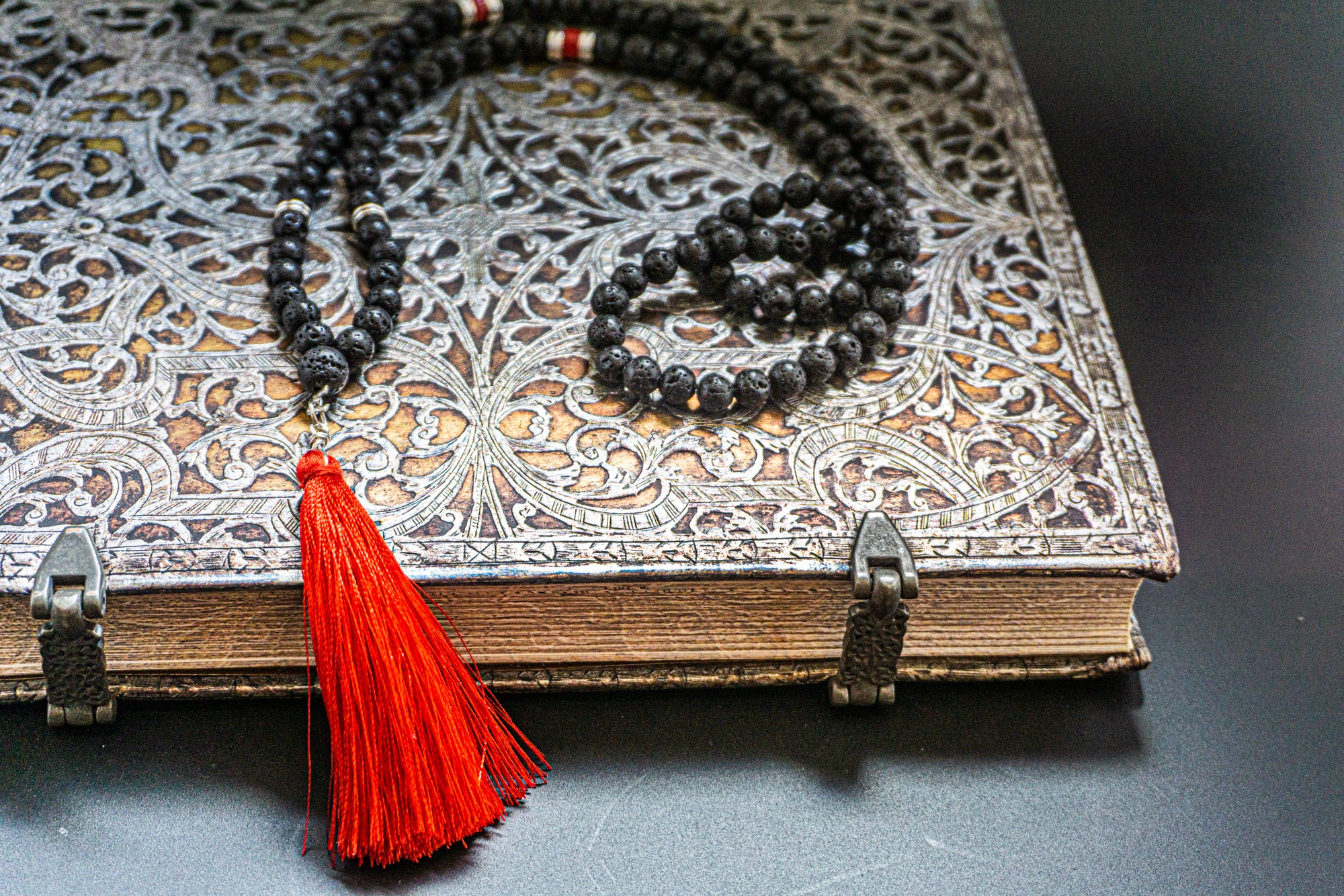 red tassel mala meditation necklace made of lava stone and red agate- wander jewellery