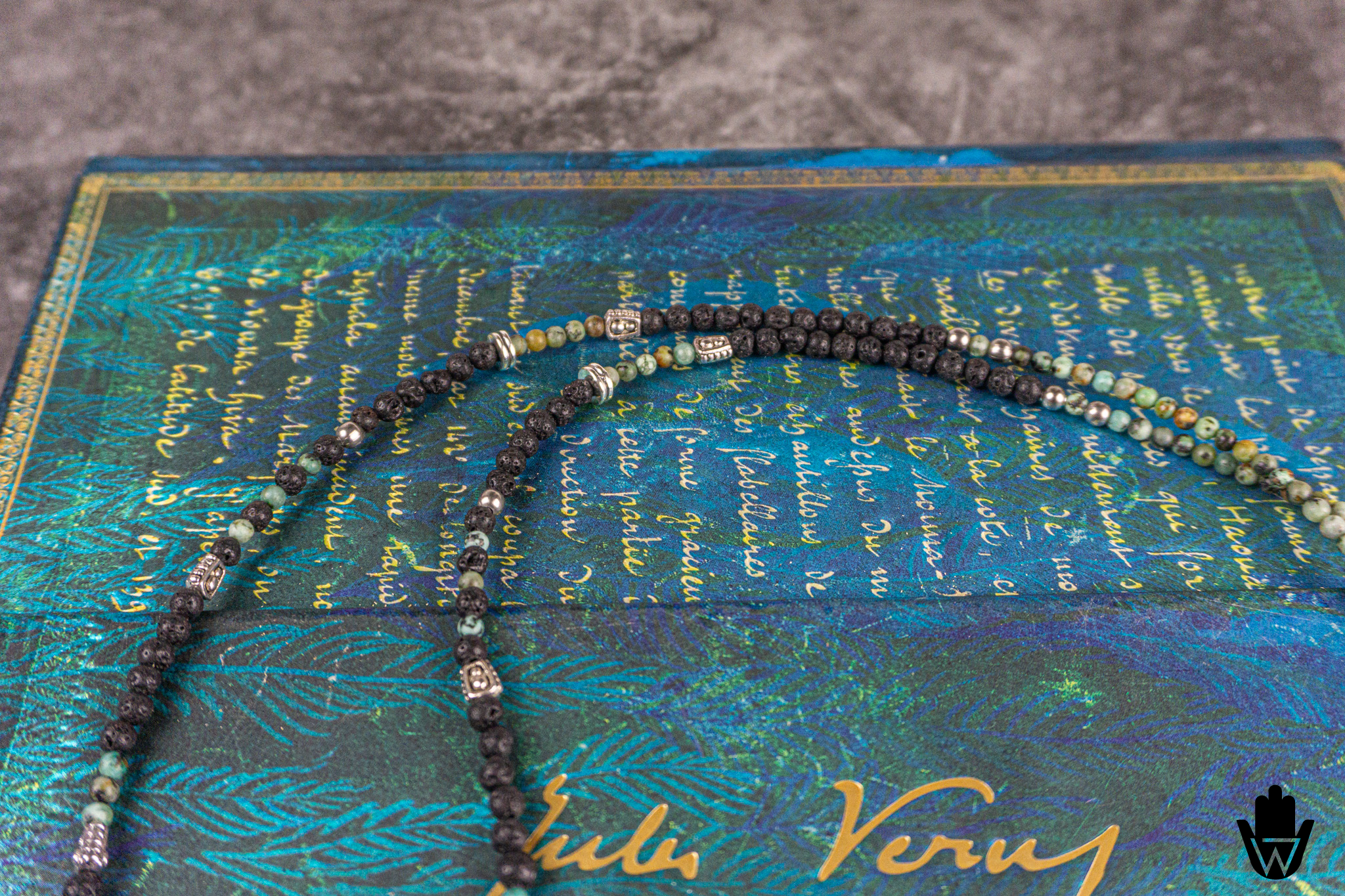 black lava stone and green african turquoise gemstone beaded necklace with silver colored details- wander jewellery