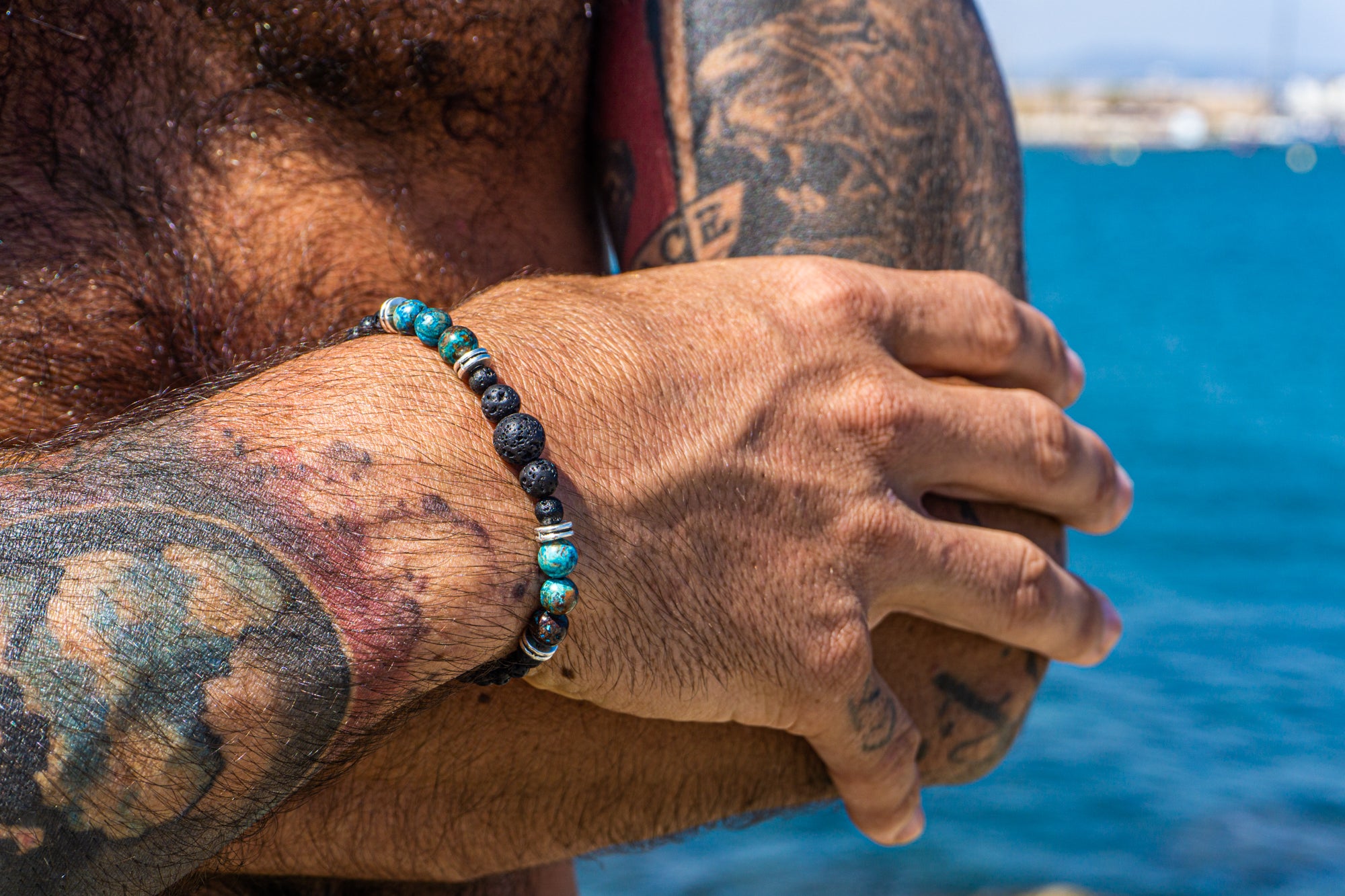 black lava stone beaded bracelet with turquoise ocean jasper gemstone bead- wander jewellery