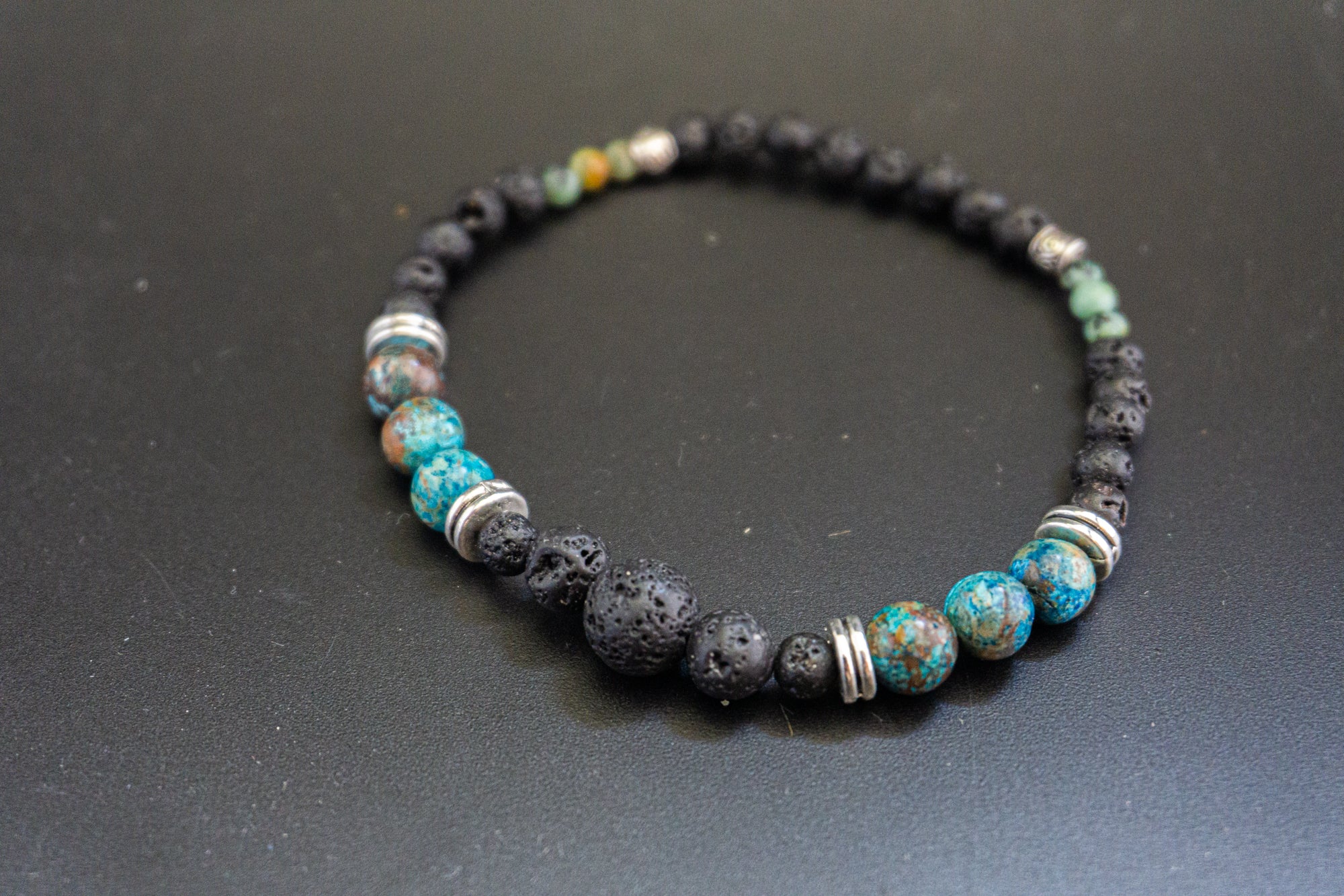 black lava beaded bracelet with turquoise ocean jasper gemstone bead- wander jewellery