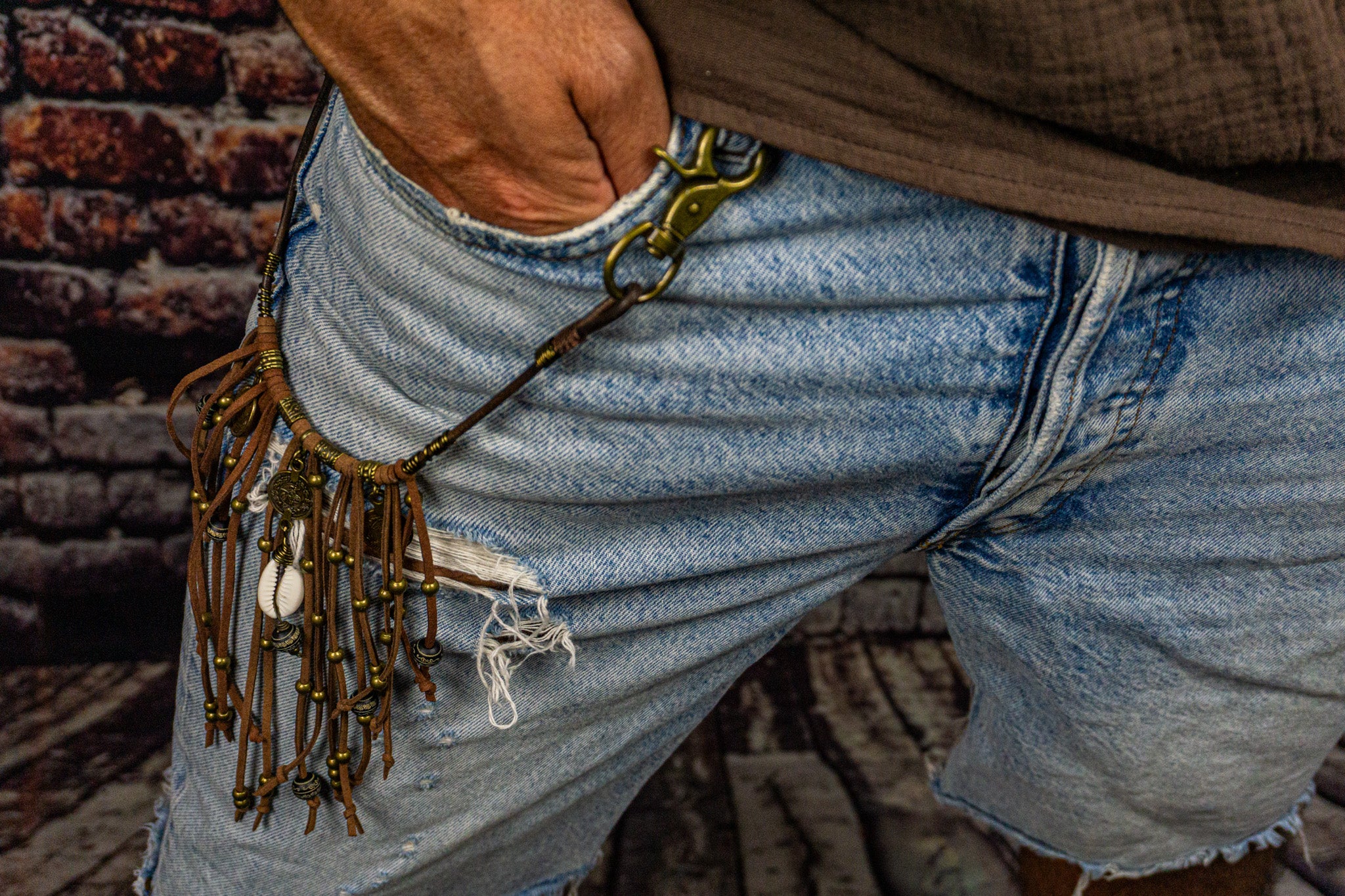 mens boho leather pants chain with bronze dangle beads and coins with a cowrie shell- wander jewellery