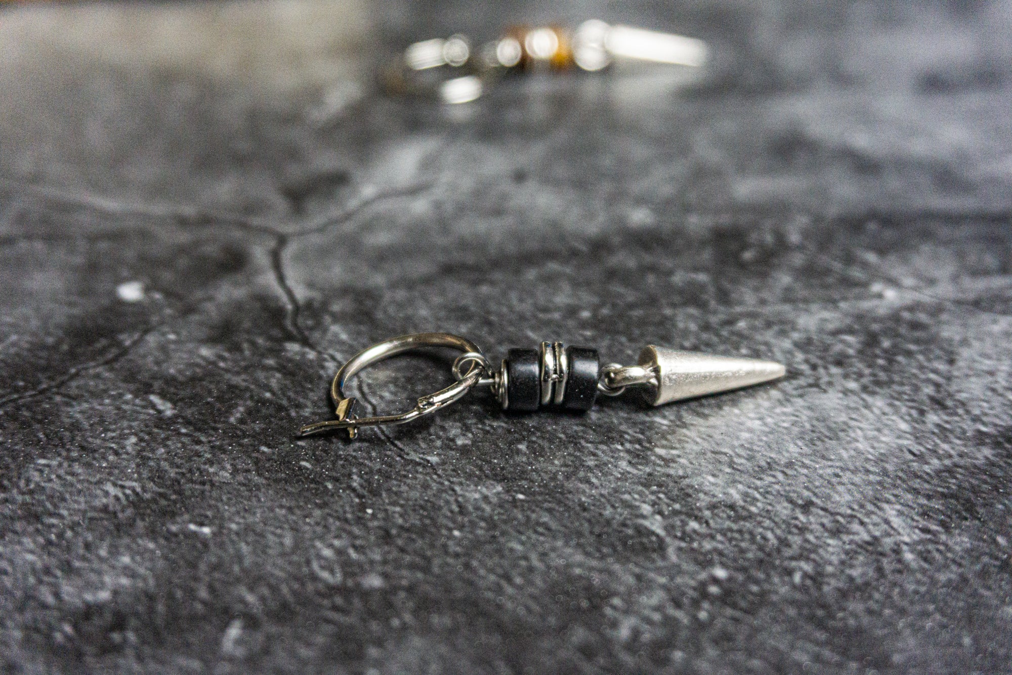 stainless steel spike hoop earring with black onyx gemstones- wander jewellery