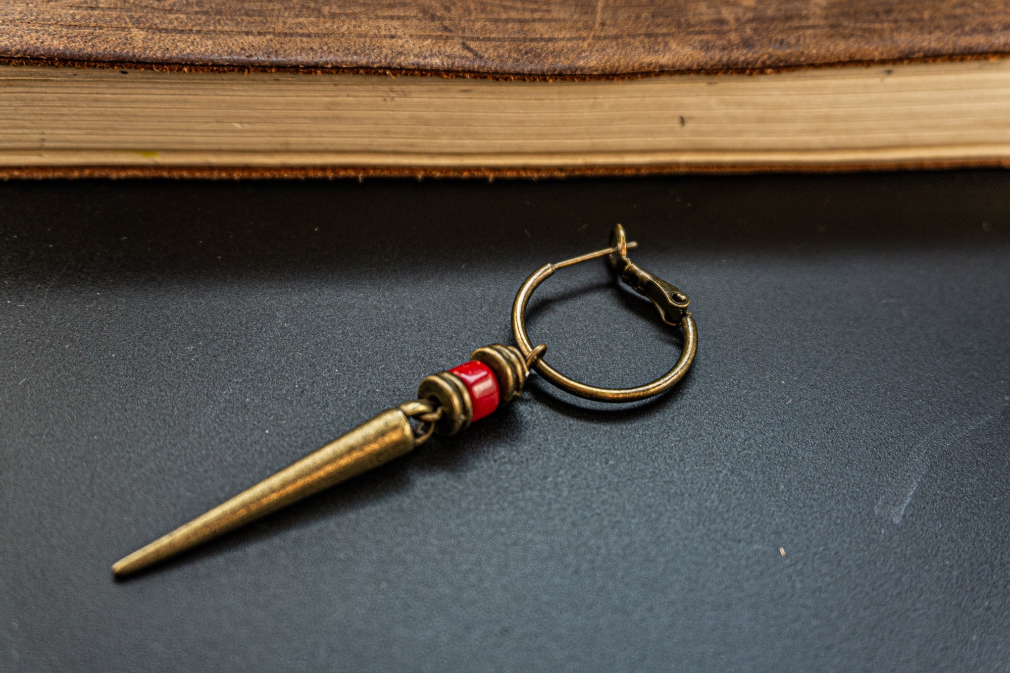  long bronze spike hoop earring with red agate gemstone bead- wander jewellery