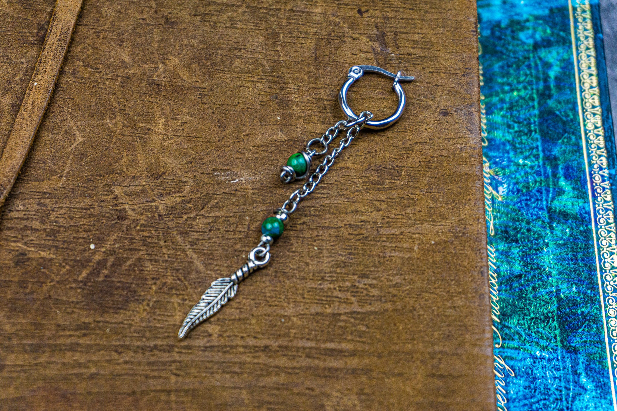 hoop earring with long chain, jade gemstone and steel feather- wander-jewellery