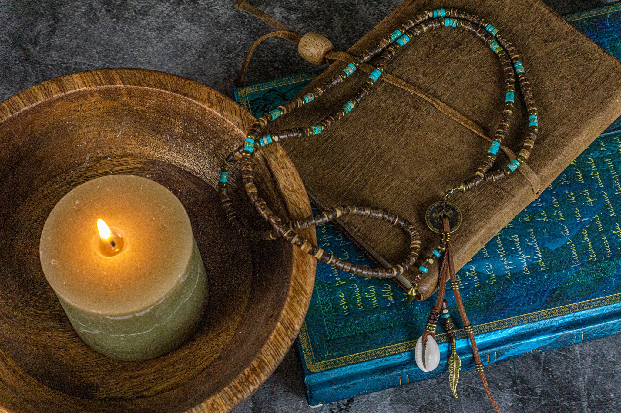 long coconut shell and turquoise gemstone bead, with a long tribal multi charm pendant- wander jewellery
