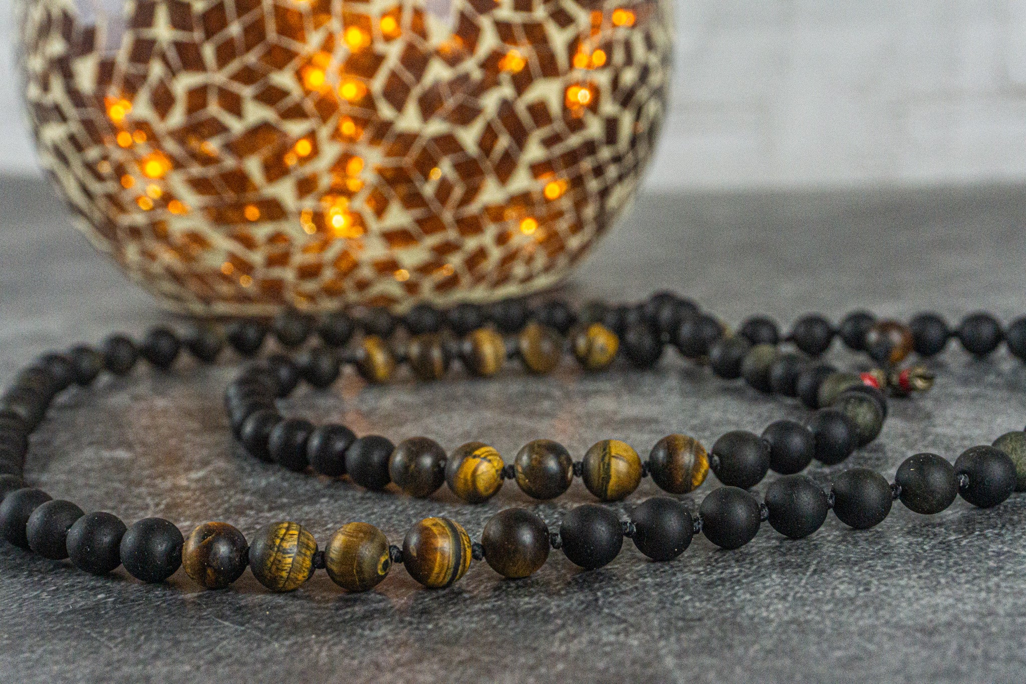 long mala necklace made of golden obsidian and frosted tiger eye gemstones- wander jewellery