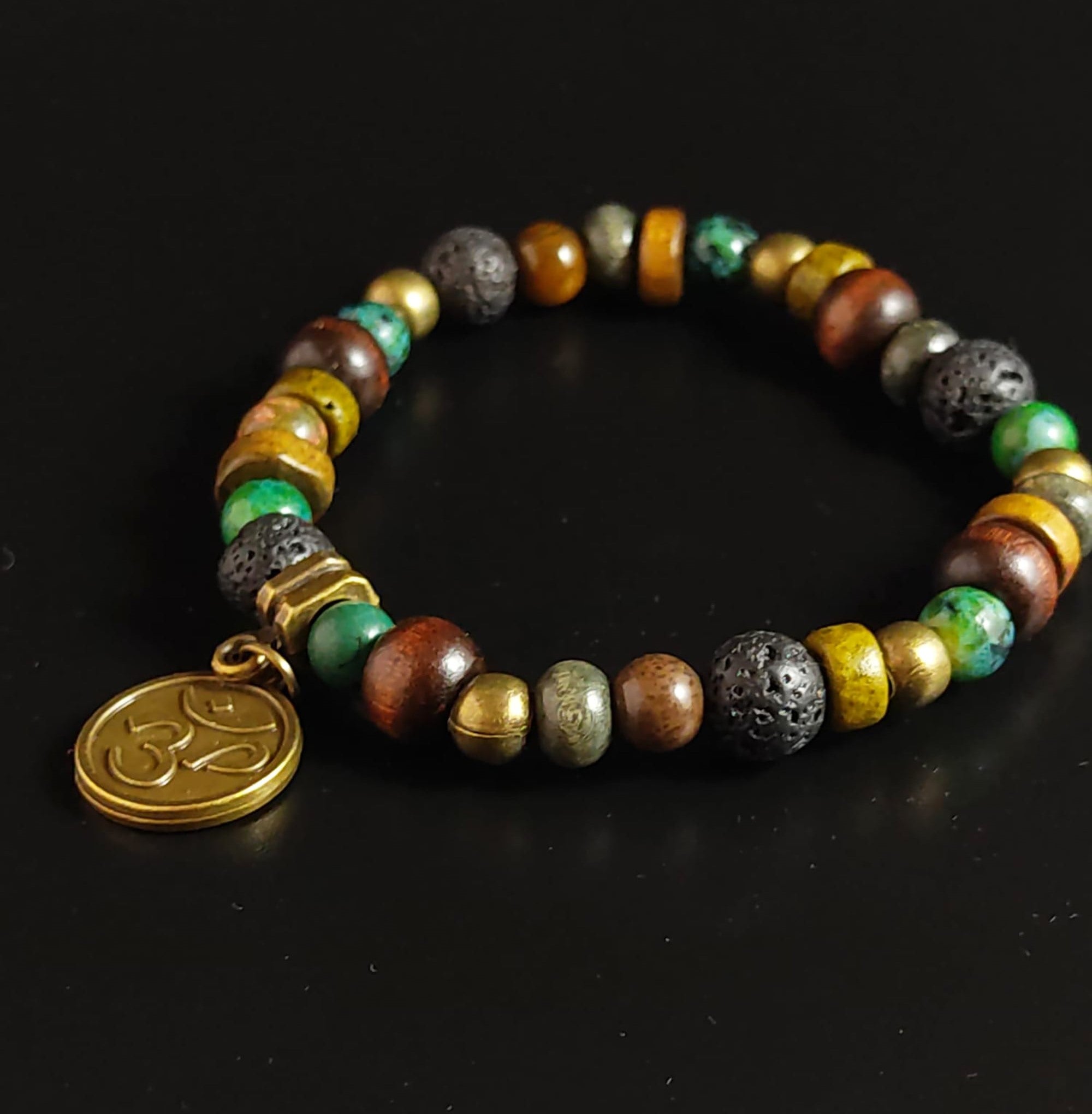 wood, lava stone and jade bracelet with om chams- wander jewellery