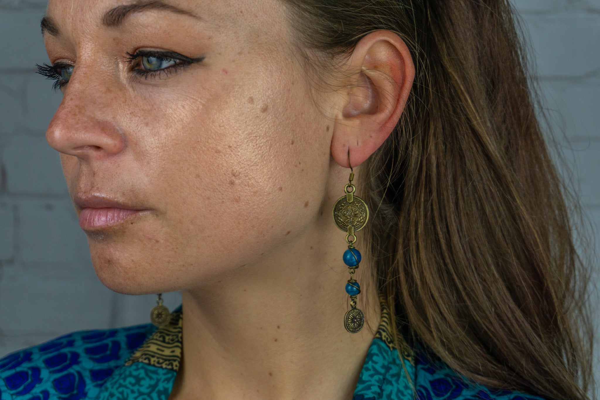 womens asymmetric matching boho chic earrings with antique bronze coins and Apatite - wander jewellery