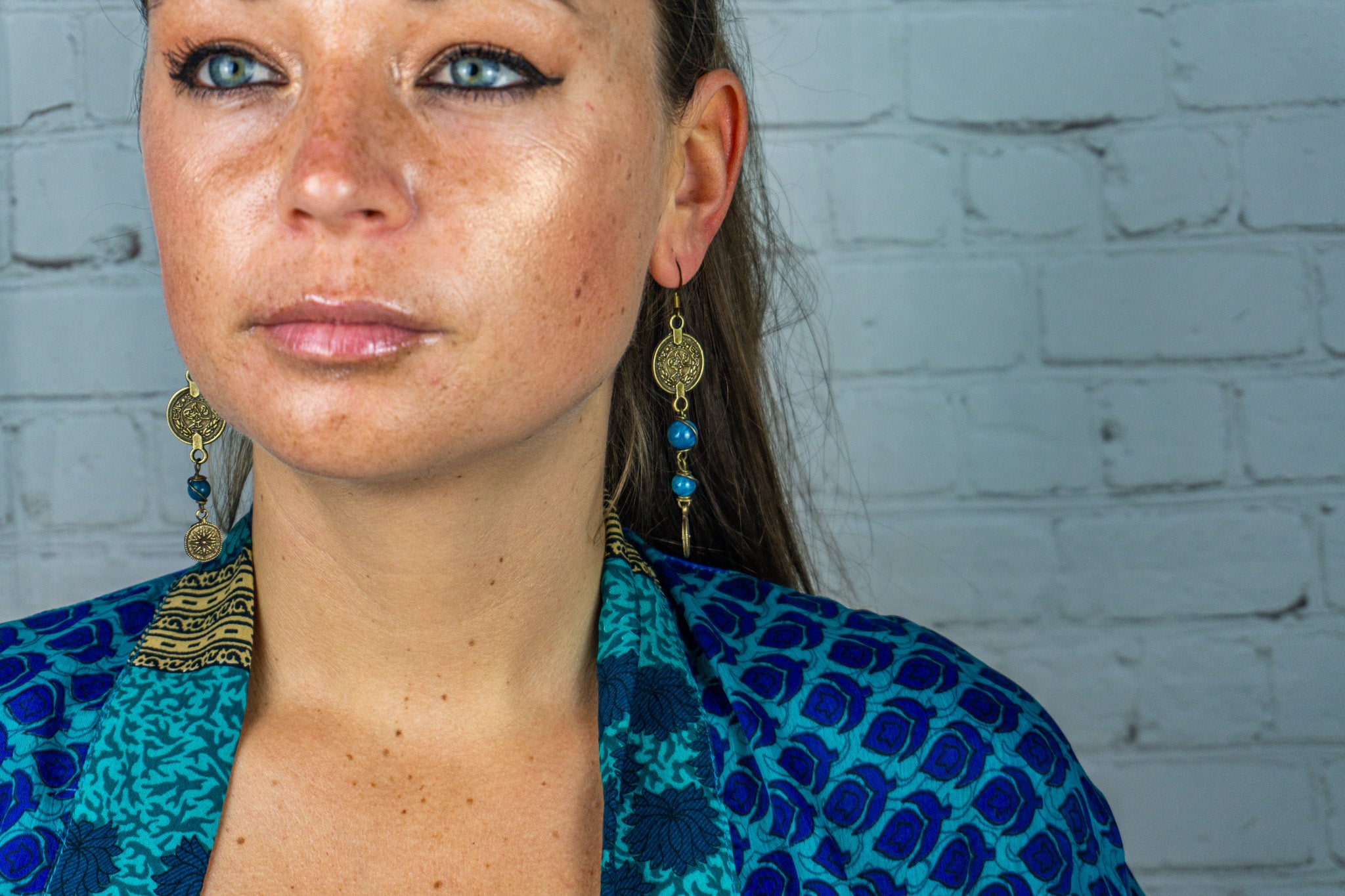 womens asymmetric boho chic earrings with antique bronze coins and Apatite gemstones- wander jewellery