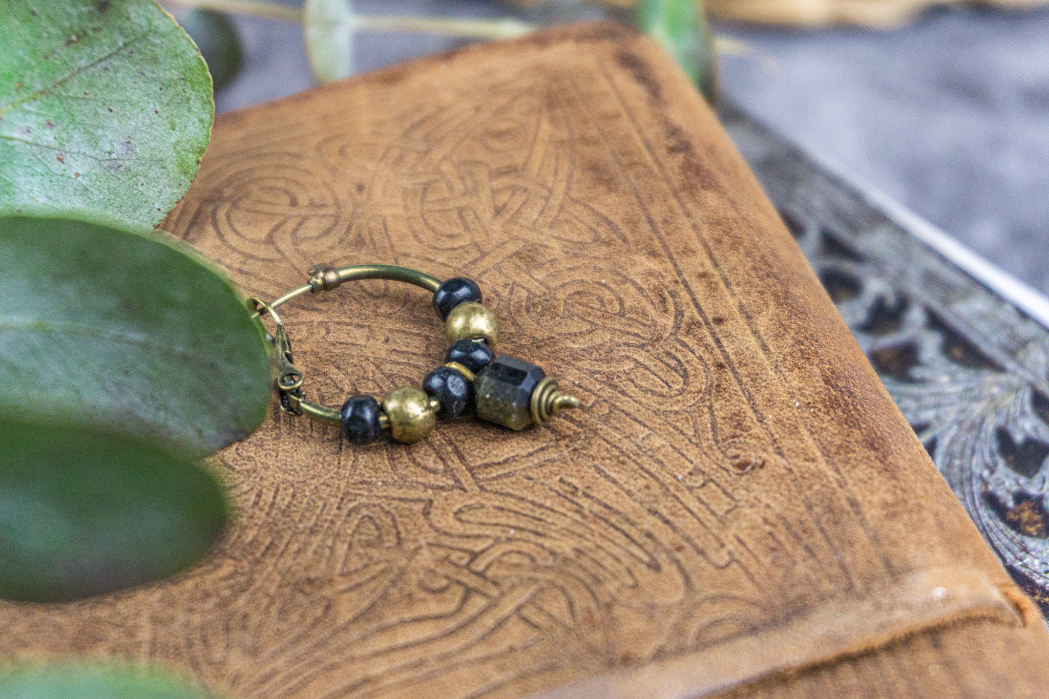 bronze hoop earring with black wooden bead and golden obsidian  gemstone - wander jewellery