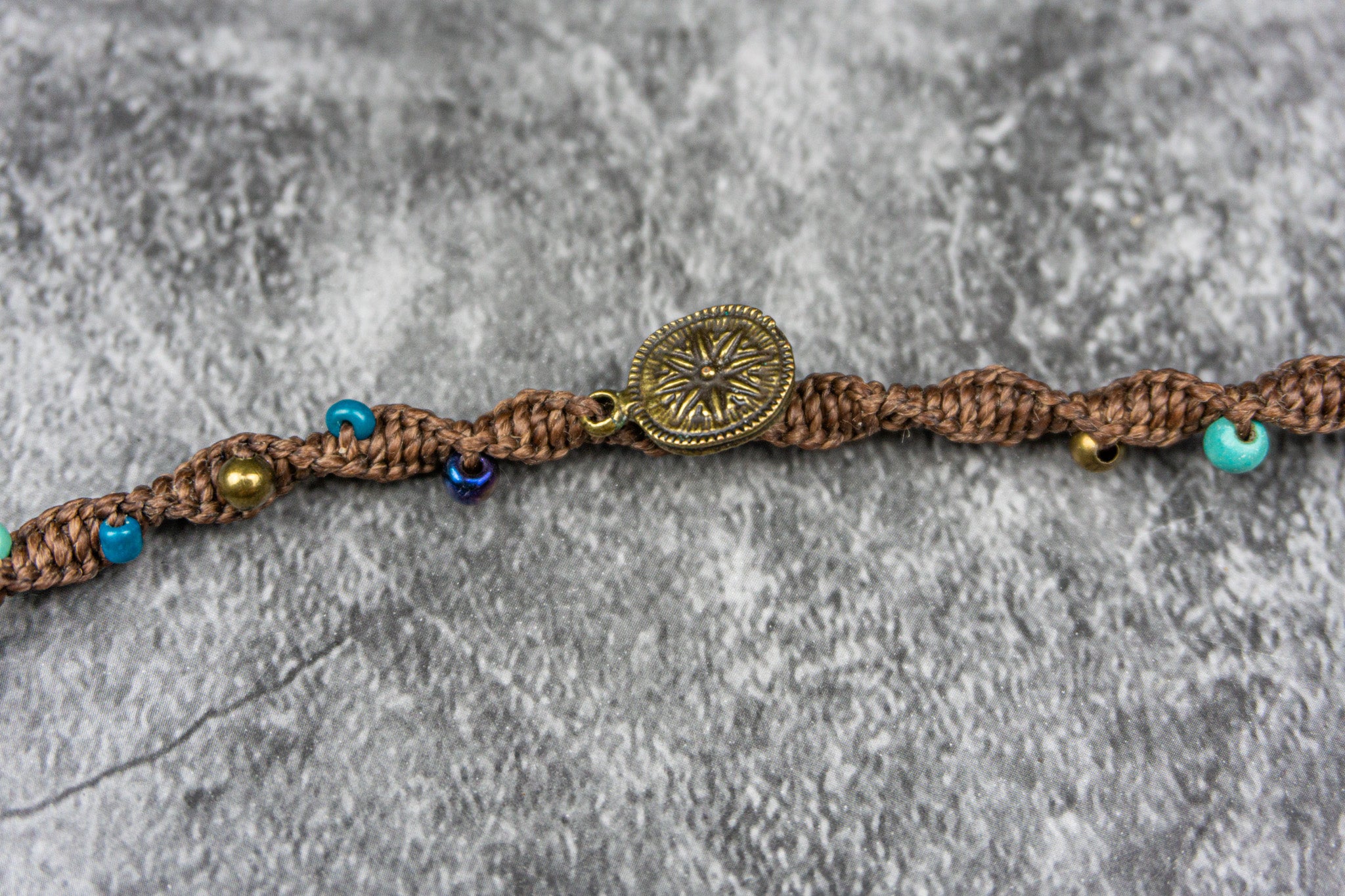 macrame hair wrap with colorful beads stones and bronze charms- wanderjewellery