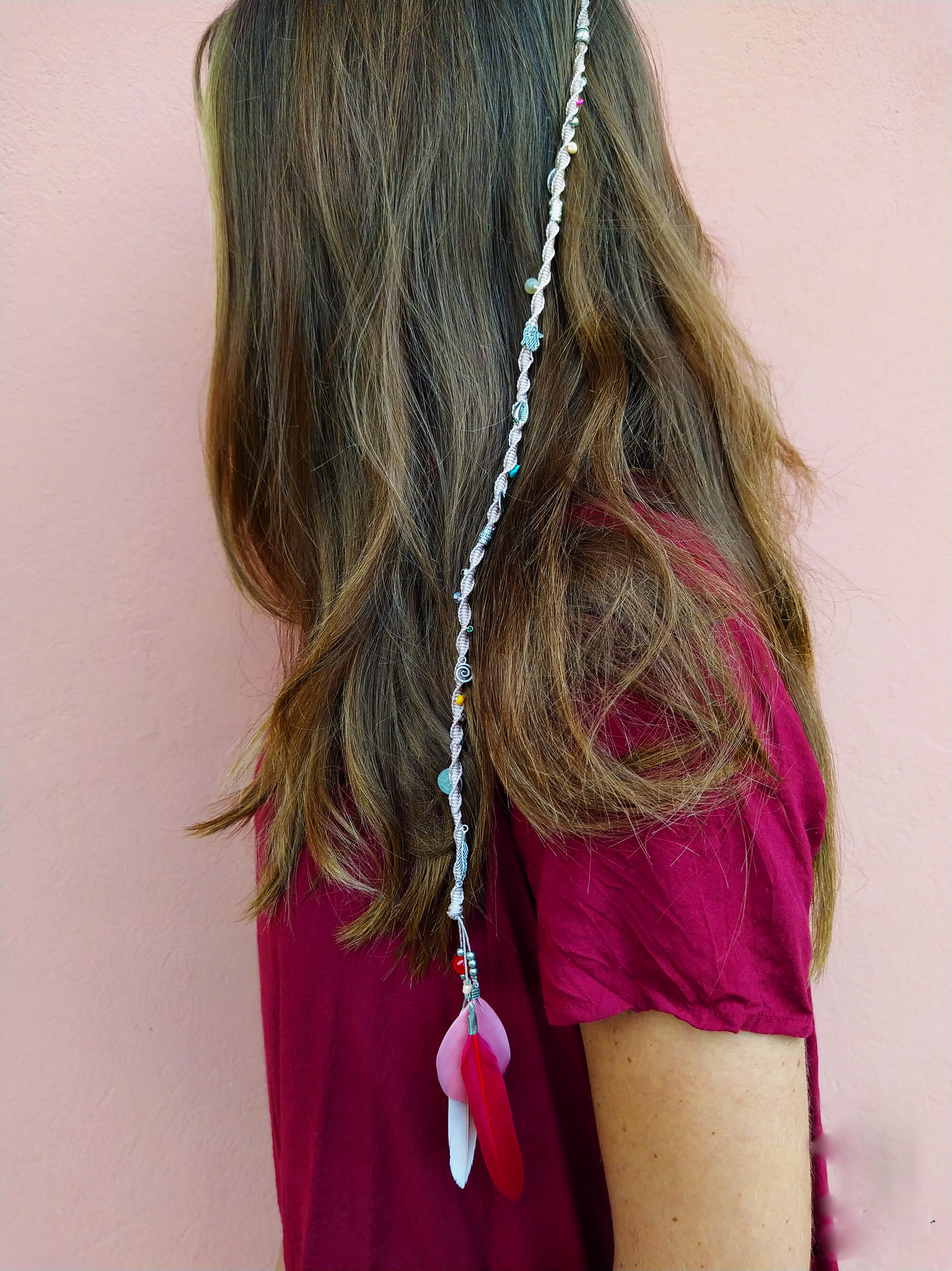 womens pink woven macrame hair wrap with charms and pink feathers- wander jewellery