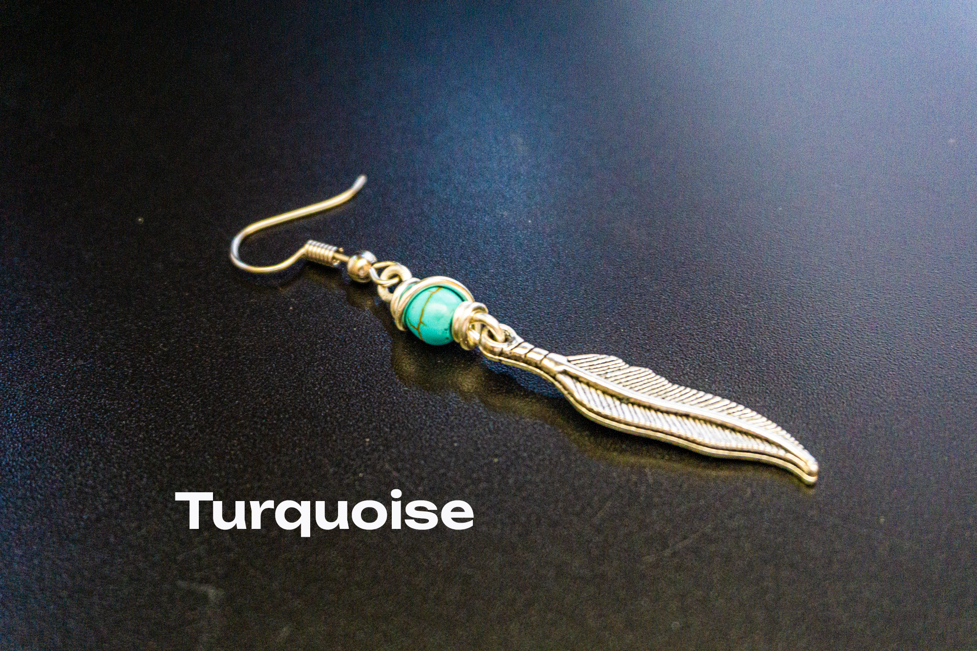 silver feather dangle earring with turquoise gemstone- wander jewellery