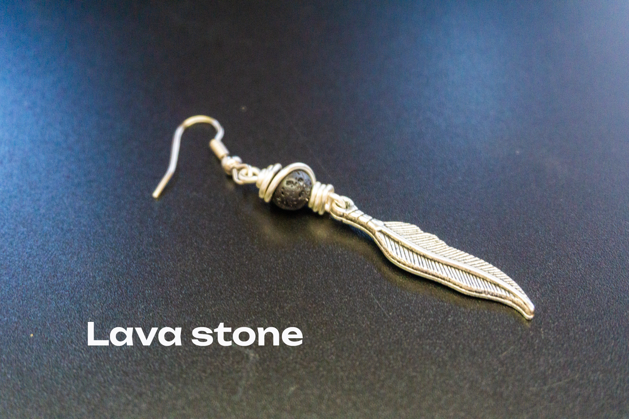 silver feather dangle earring with lava stone- wander jewellery