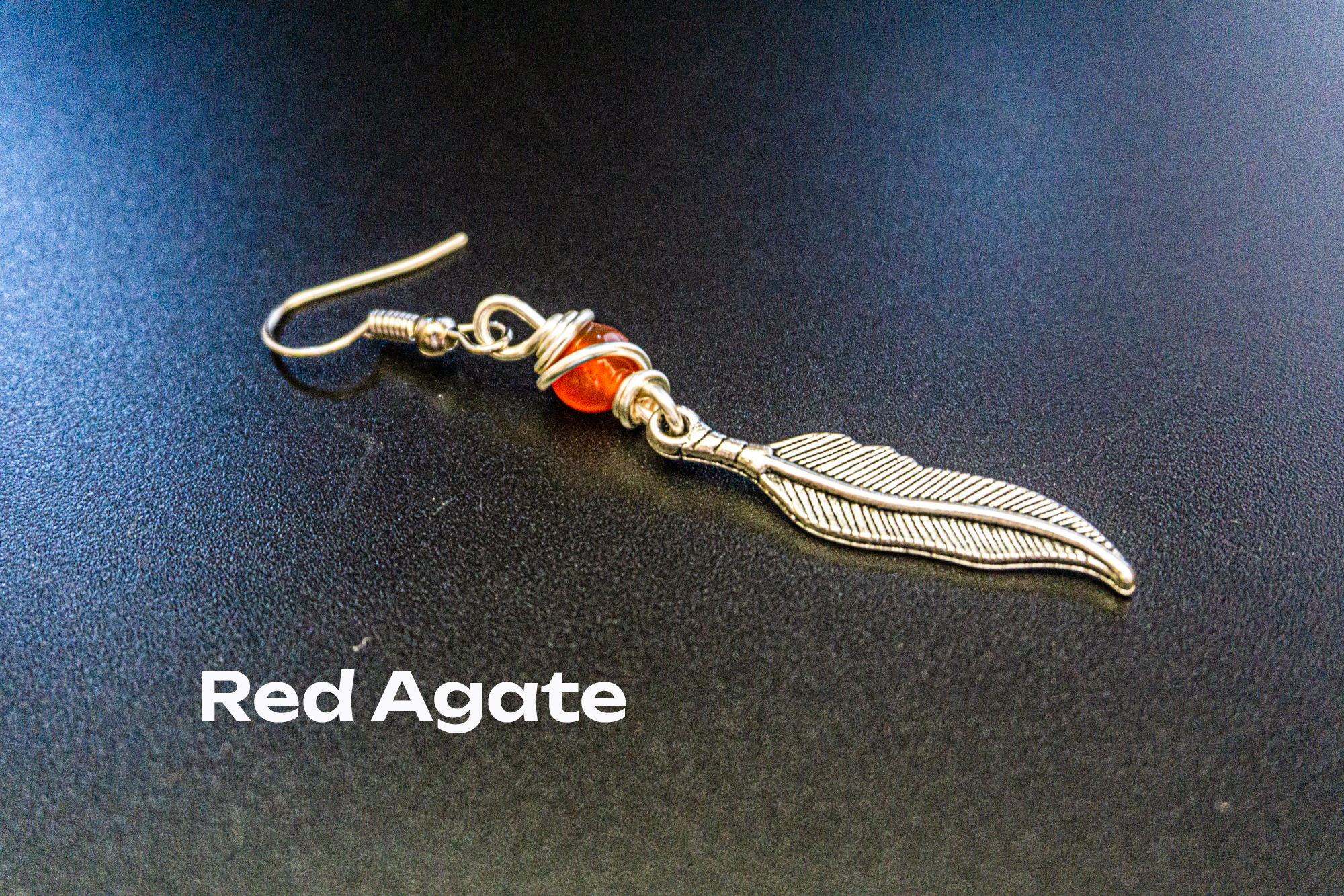 silver feather dangle earring with red agate gemstone- wander jewellery
