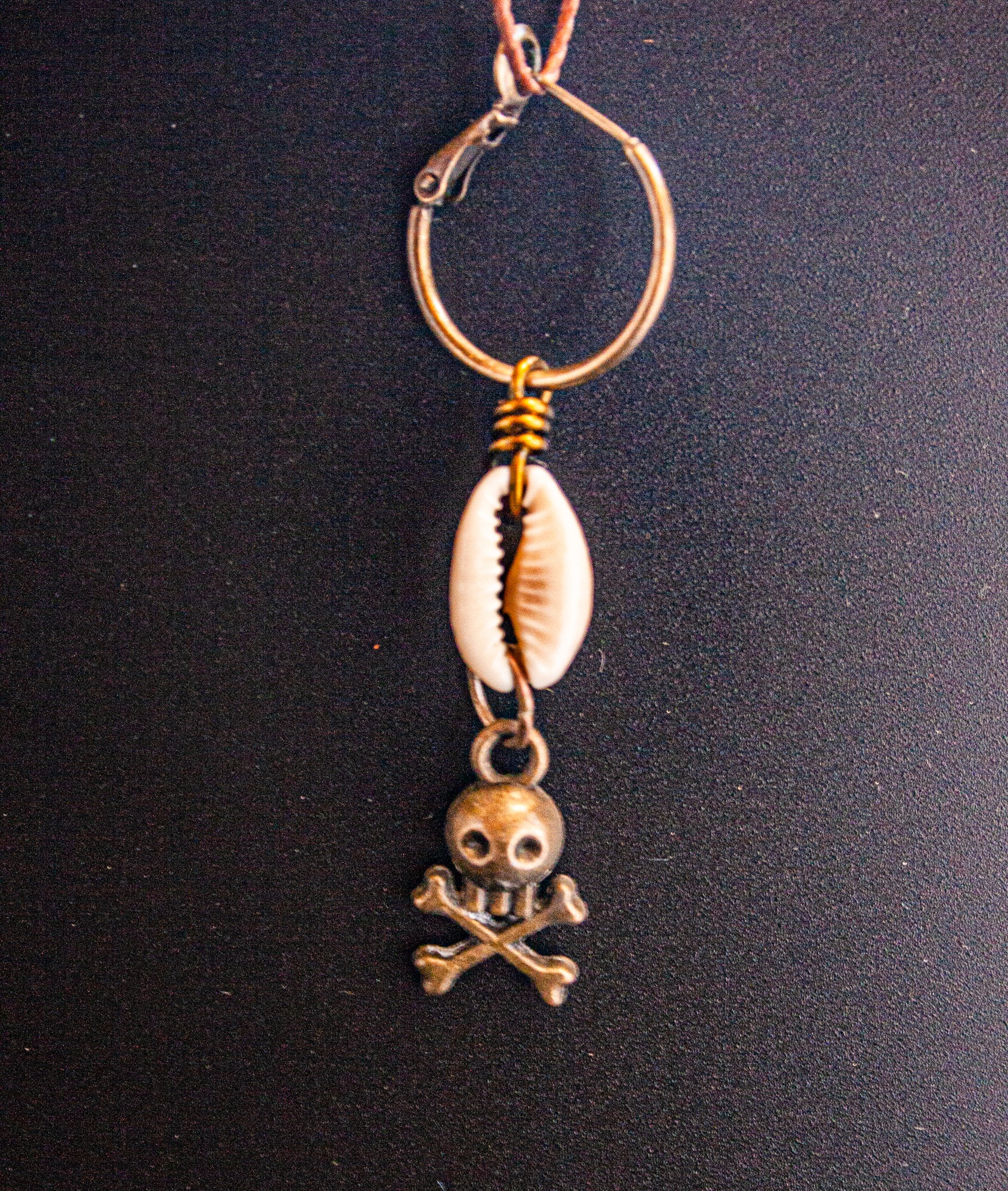 hoop earring with shell and skull dangle- wander jewellery