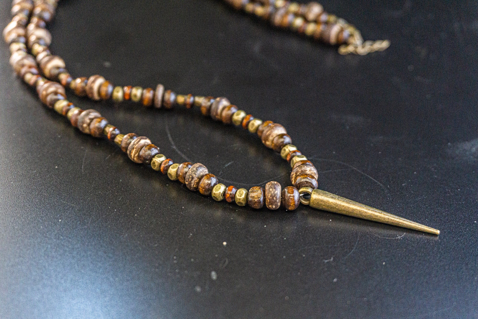 mens long wood and coconut beaded necklace with an antique  pendant- wander jewellery