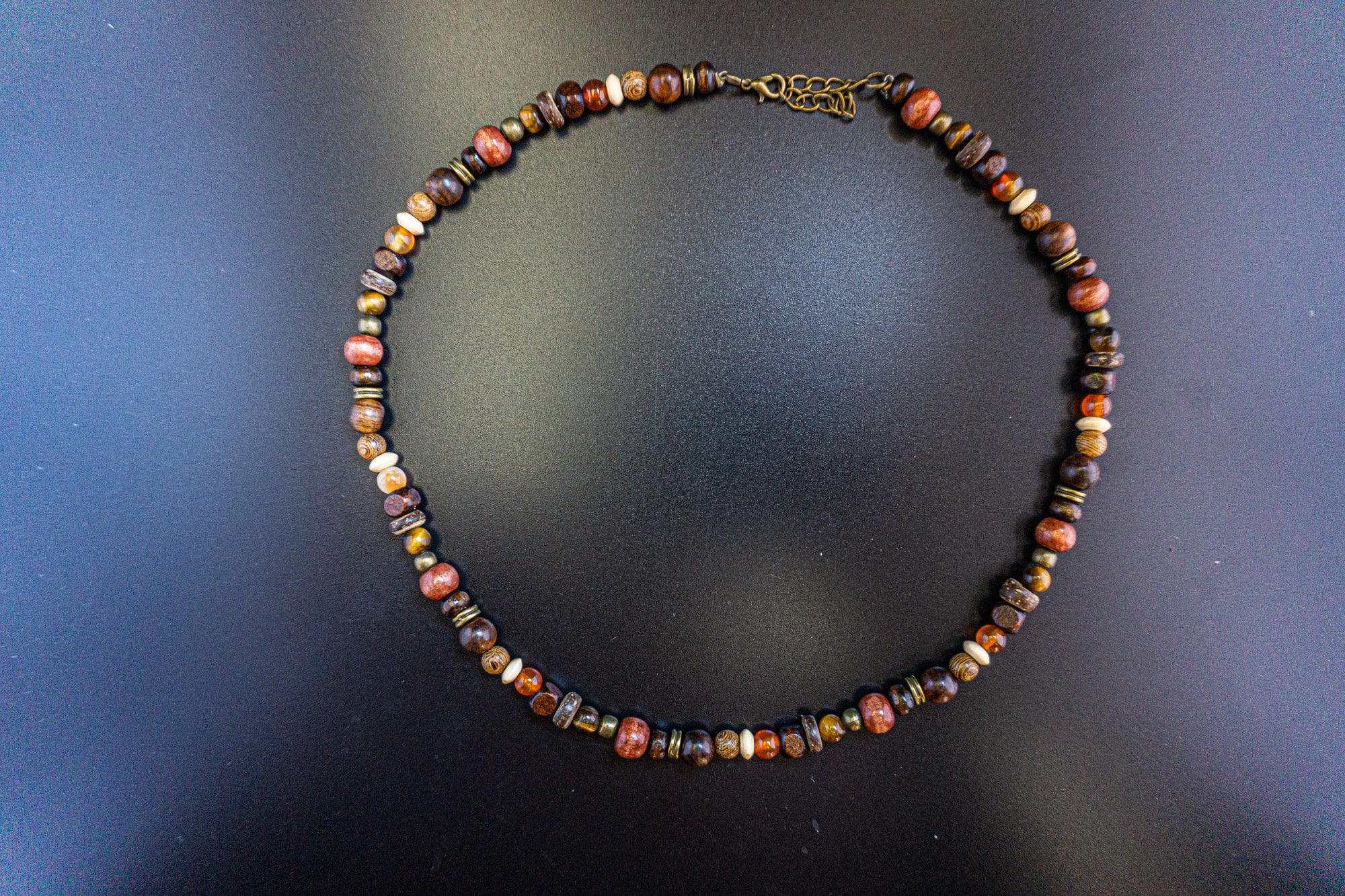 surfer choker necklace made of wood, coconut, agate and tiger eye gemstones- wander jewellery