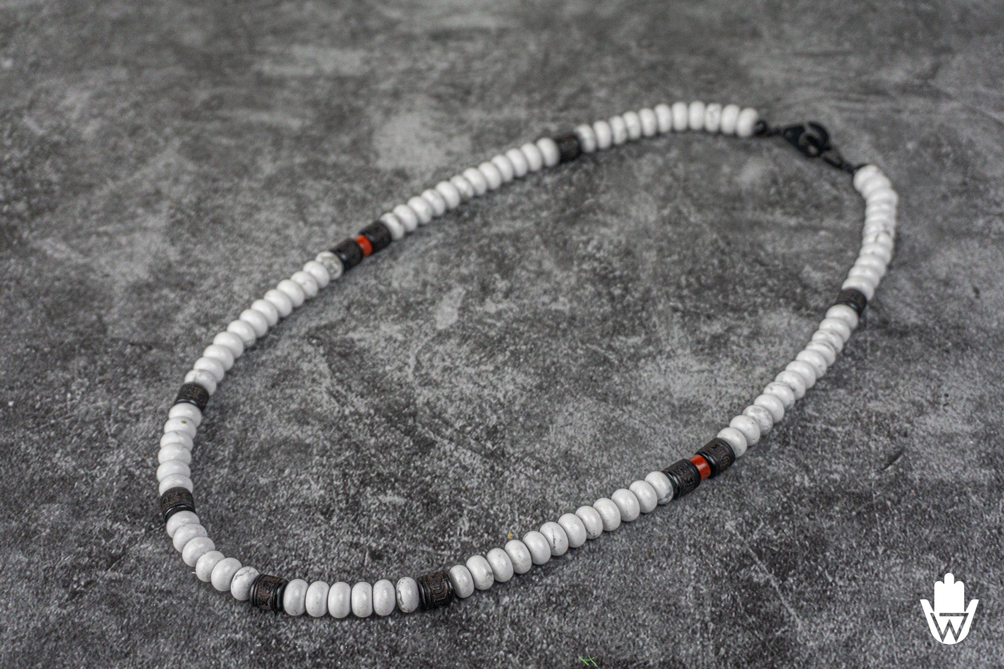 whitebeaded necklace with wooden and red details