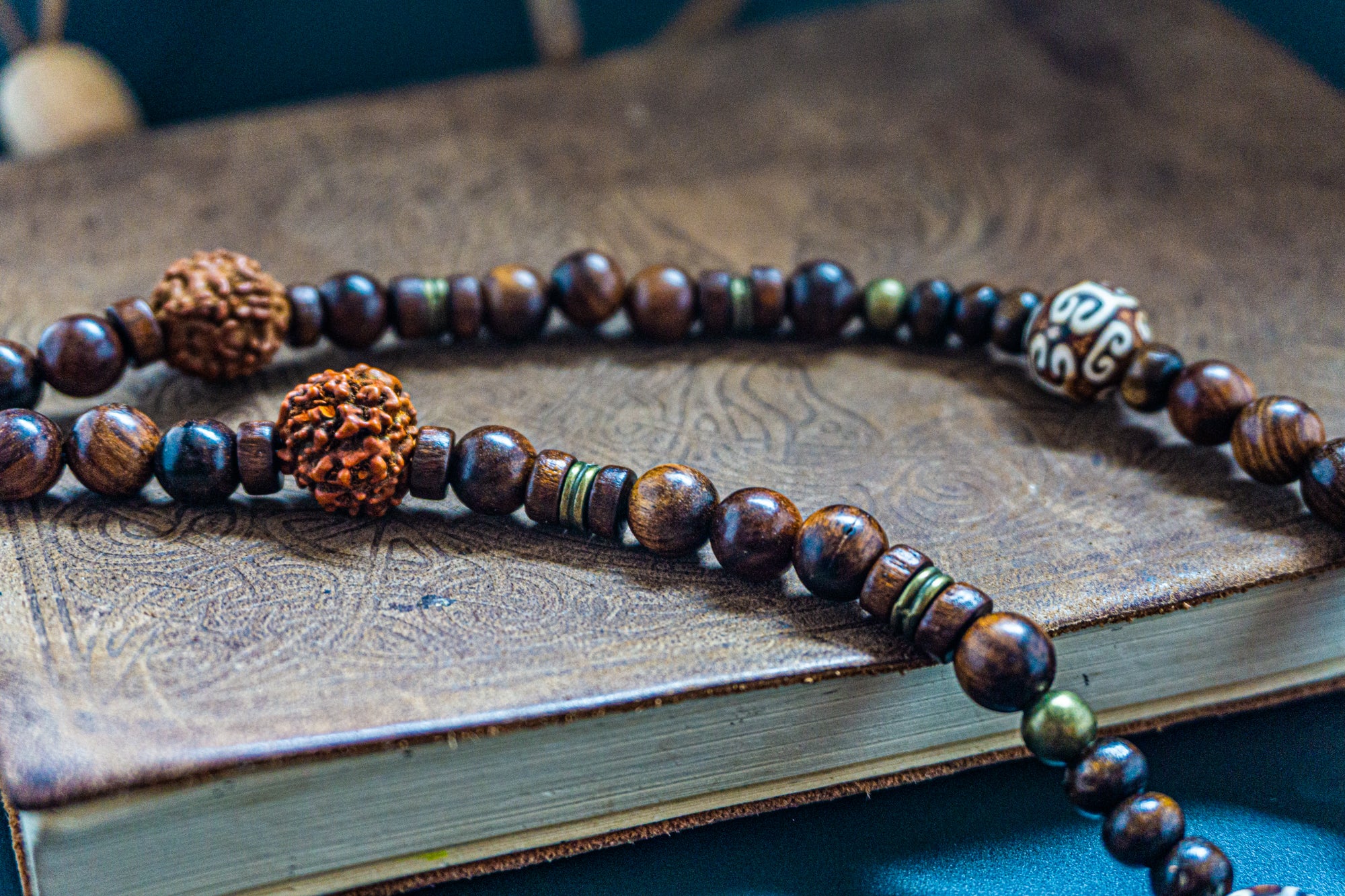 wood beaded necklace with rudraksha seeds and bronze details- wander jewellery
