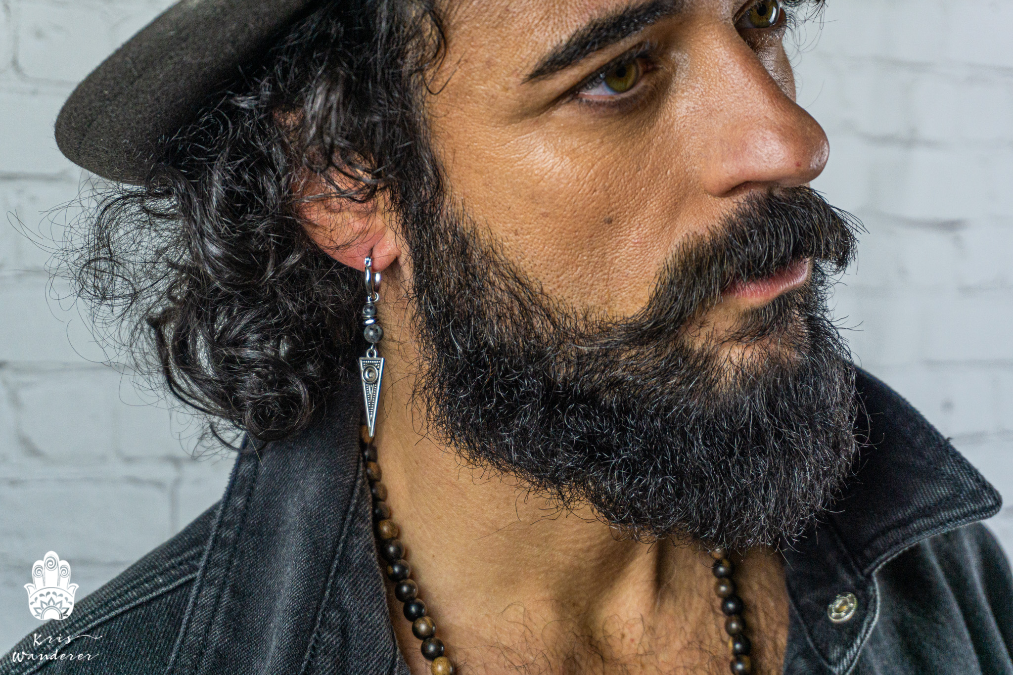 mens wearing a stainless steel hoop triangle earring with a labradorite gemstone