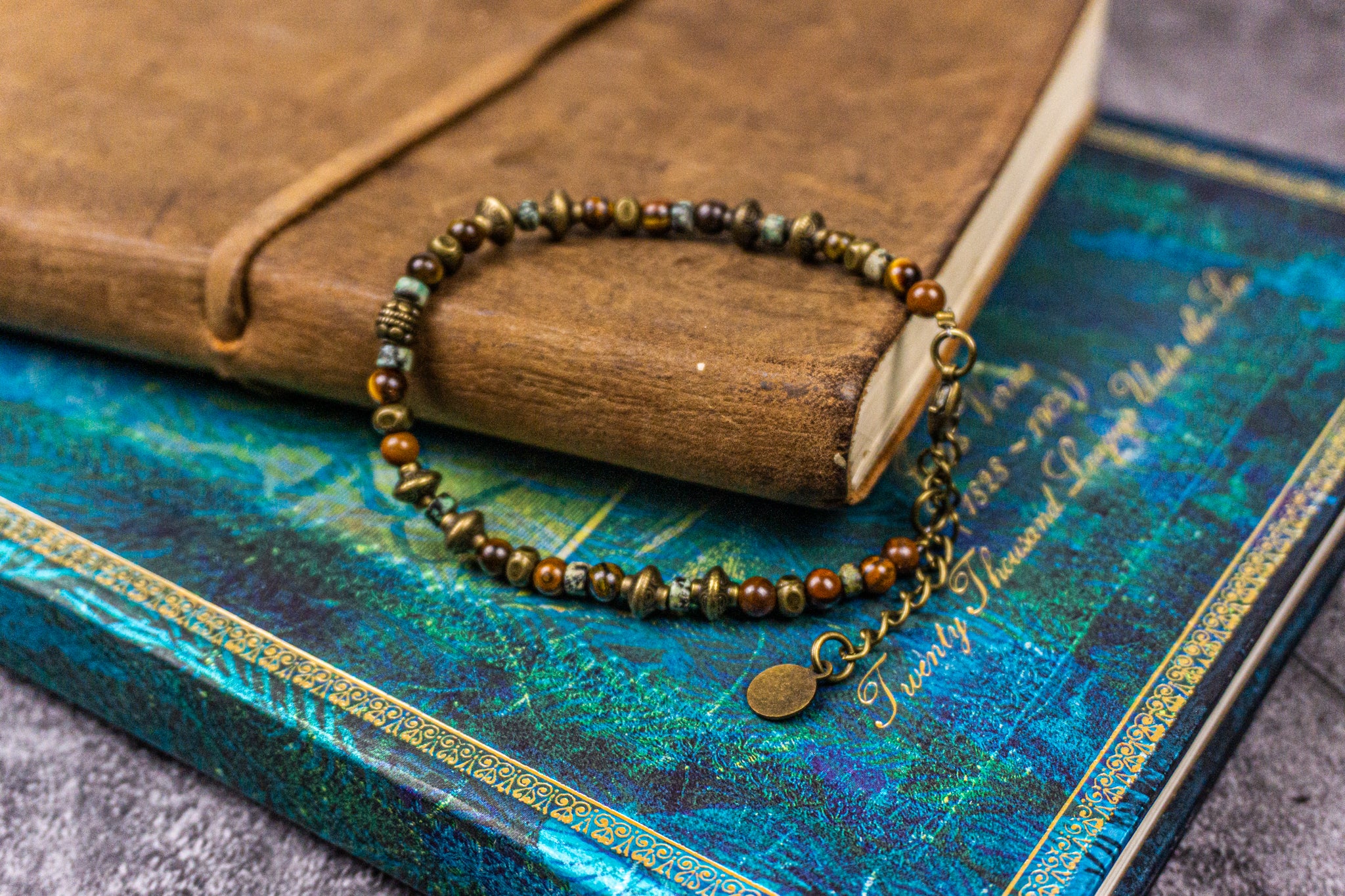dainty gemstone and brronze earthy beads bracelet with cdangle hain- wander jewellery