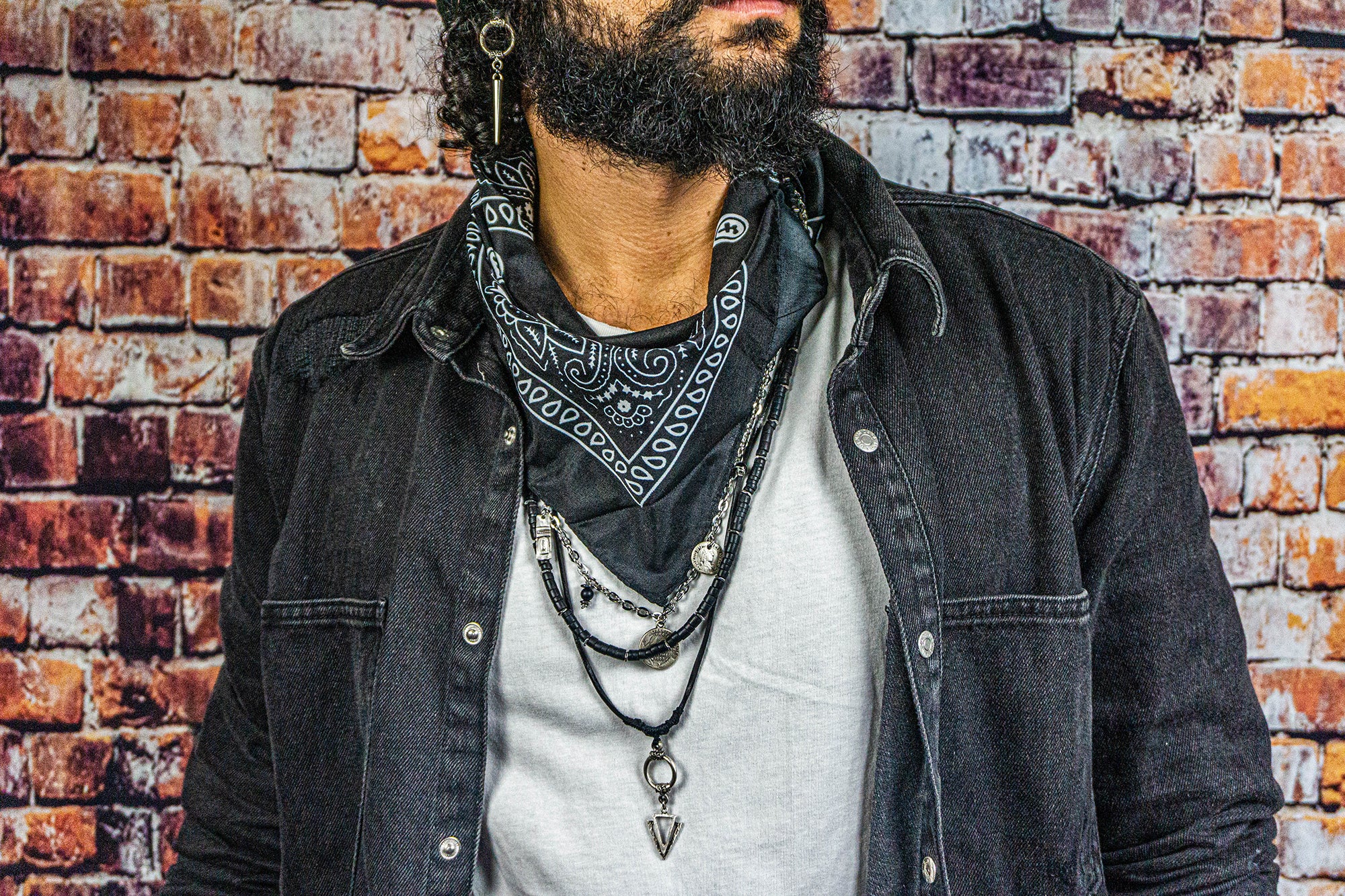 black bandana layered pirate necklace made of stainless steel chain strand, black leather strand with arrowed pendant and black coconut strand