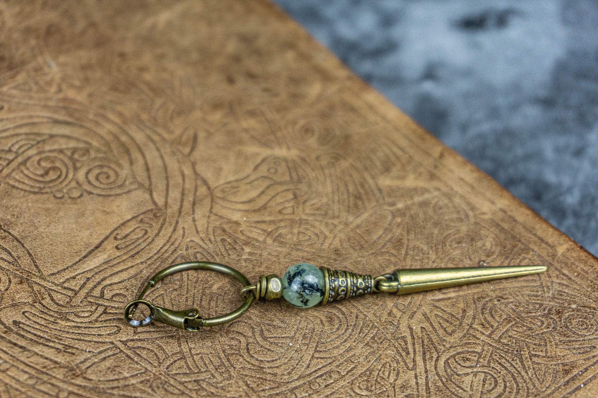long bronze dangle spike hoop earring with prenhite gemstone